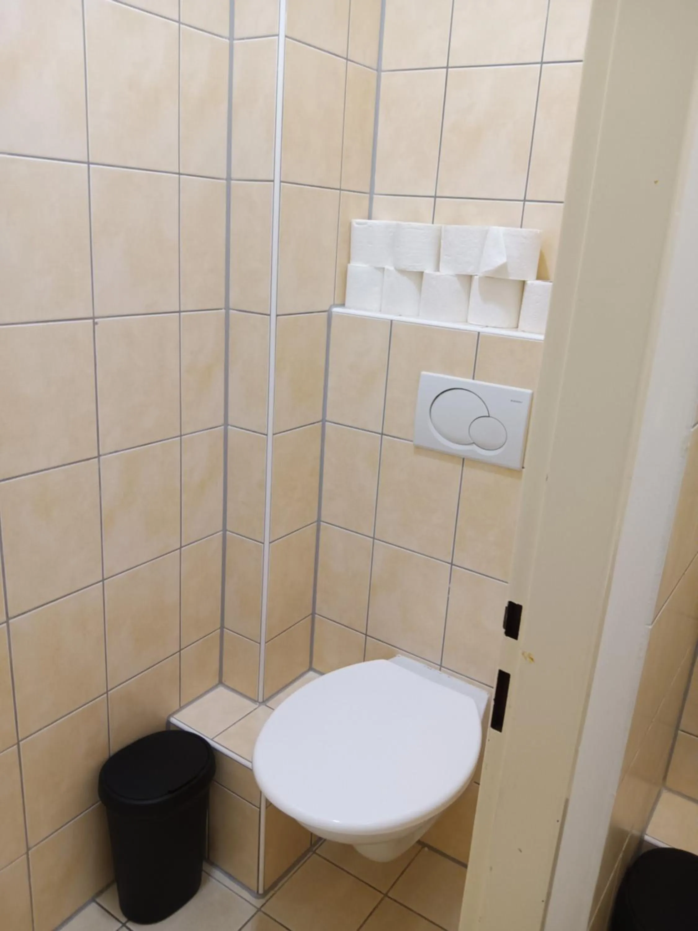 Toilet in Powder Tower Suites