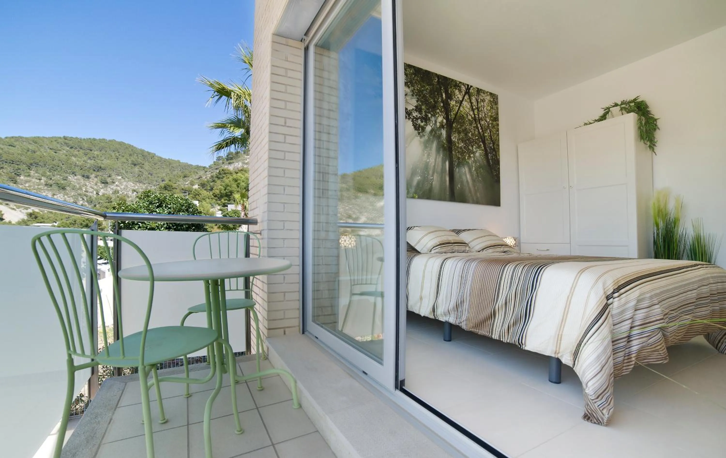 Bed in Modern Duplex in Sitges with Private Parking, Sea Views & Terrace