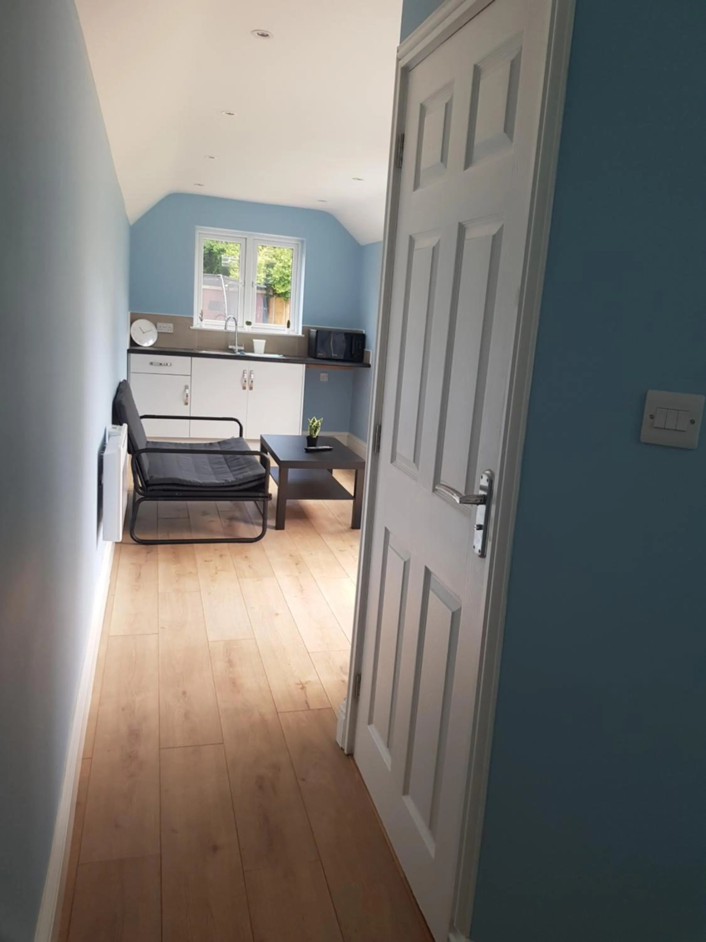 Living room in Cosy Studio Luton