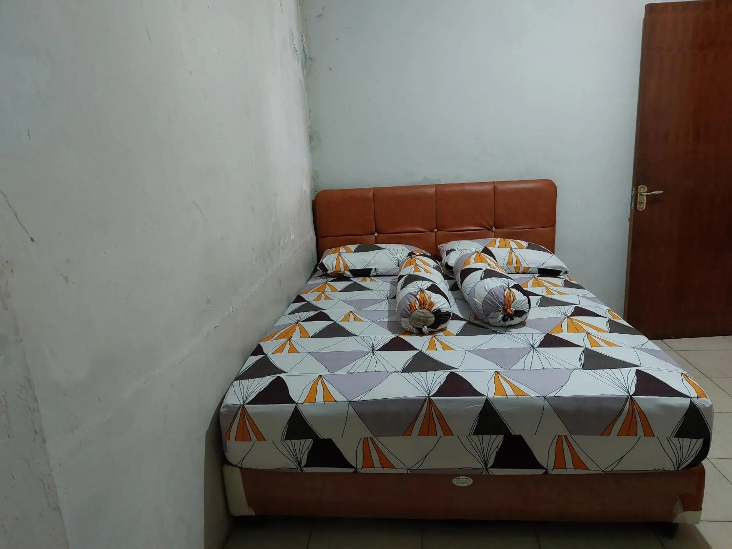 Bedroom, Bed in SPOT ON 92777 Leheran Homestay