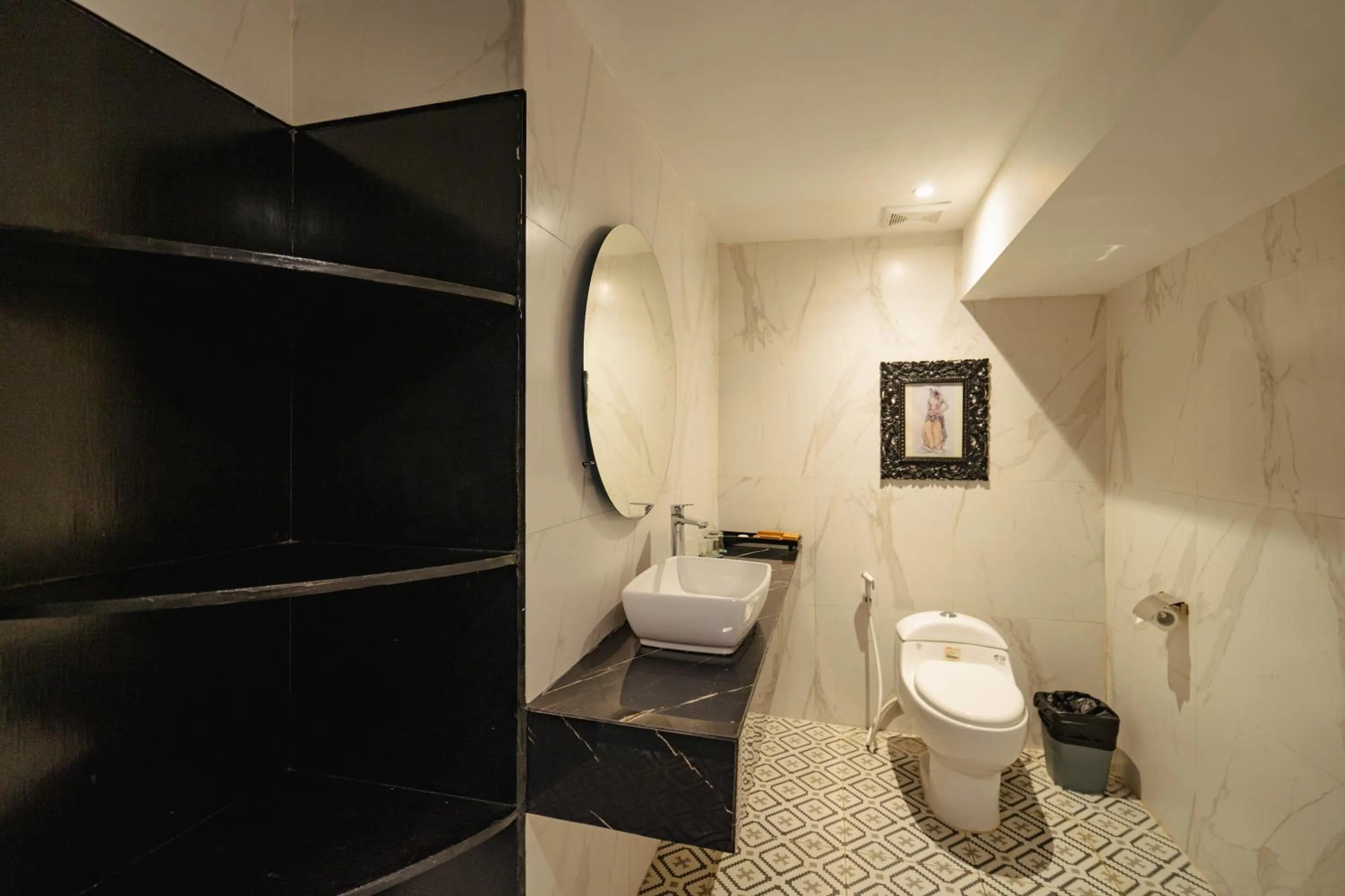 Toilet in Casa Wina Kuta Managed by ARM Hospitality