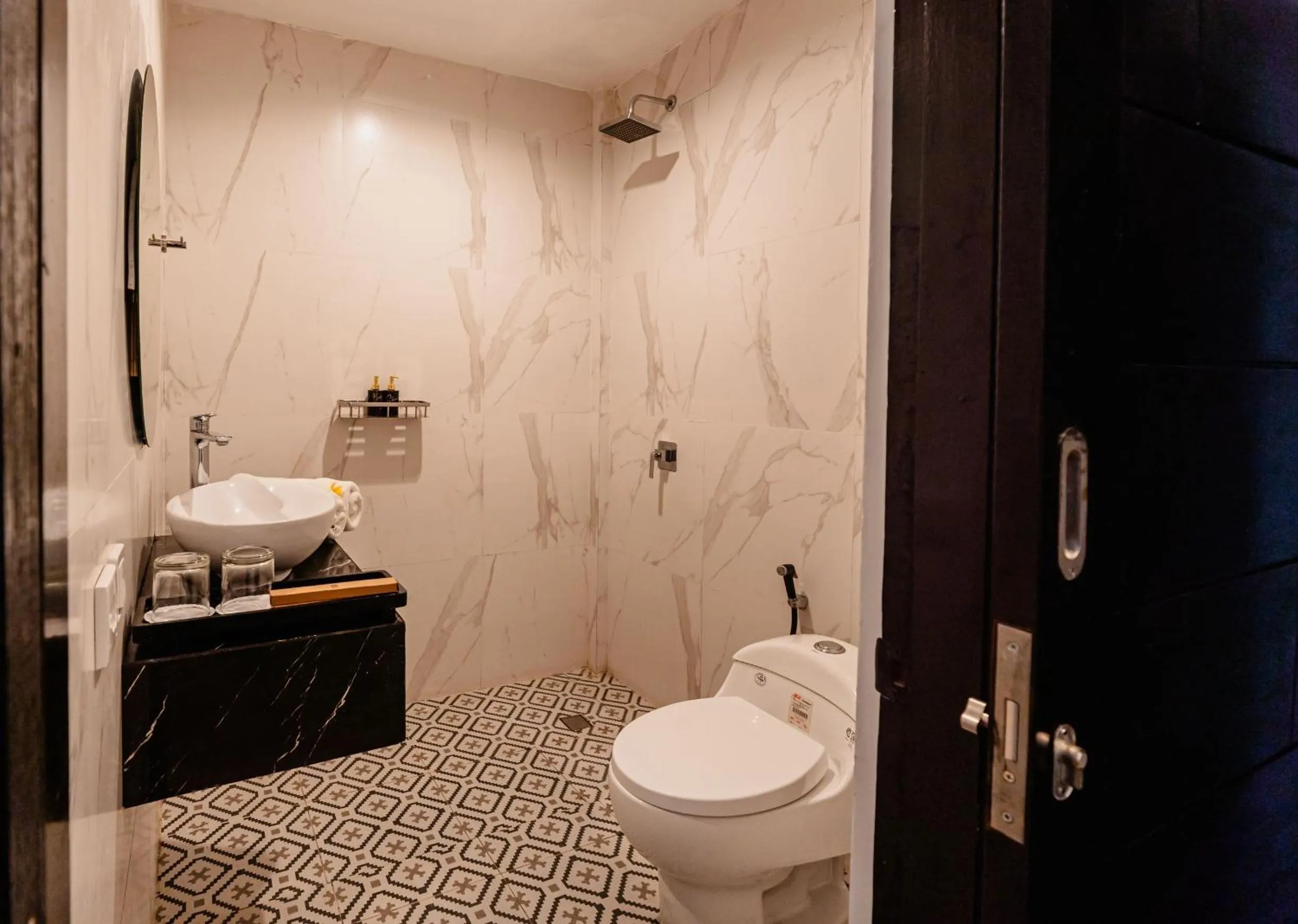 Bathroom in Casa Wina Kuta Managed by ARM Hospitality