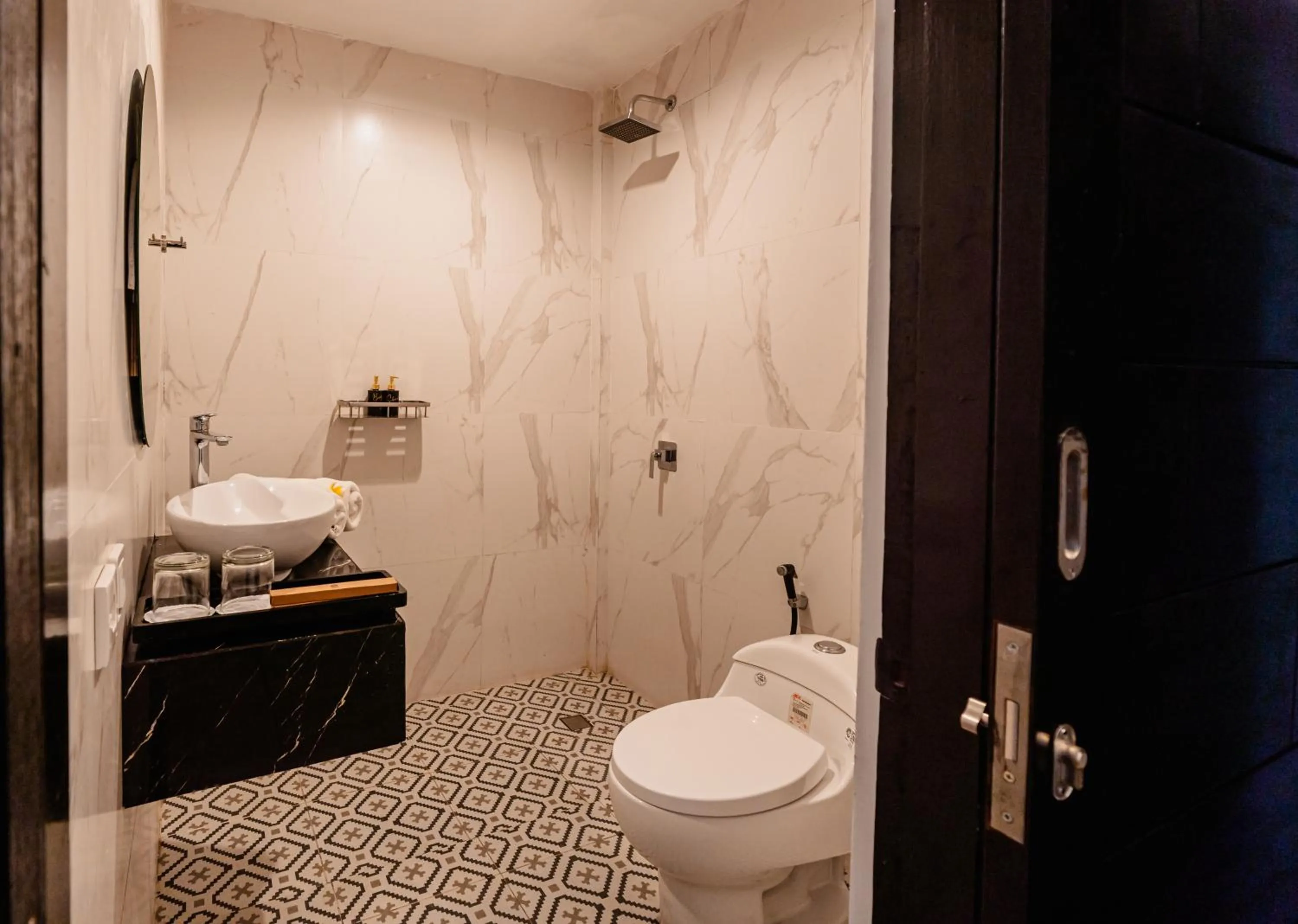 Toilet in Casa Wina Kuta Managed by ARM Hospitality