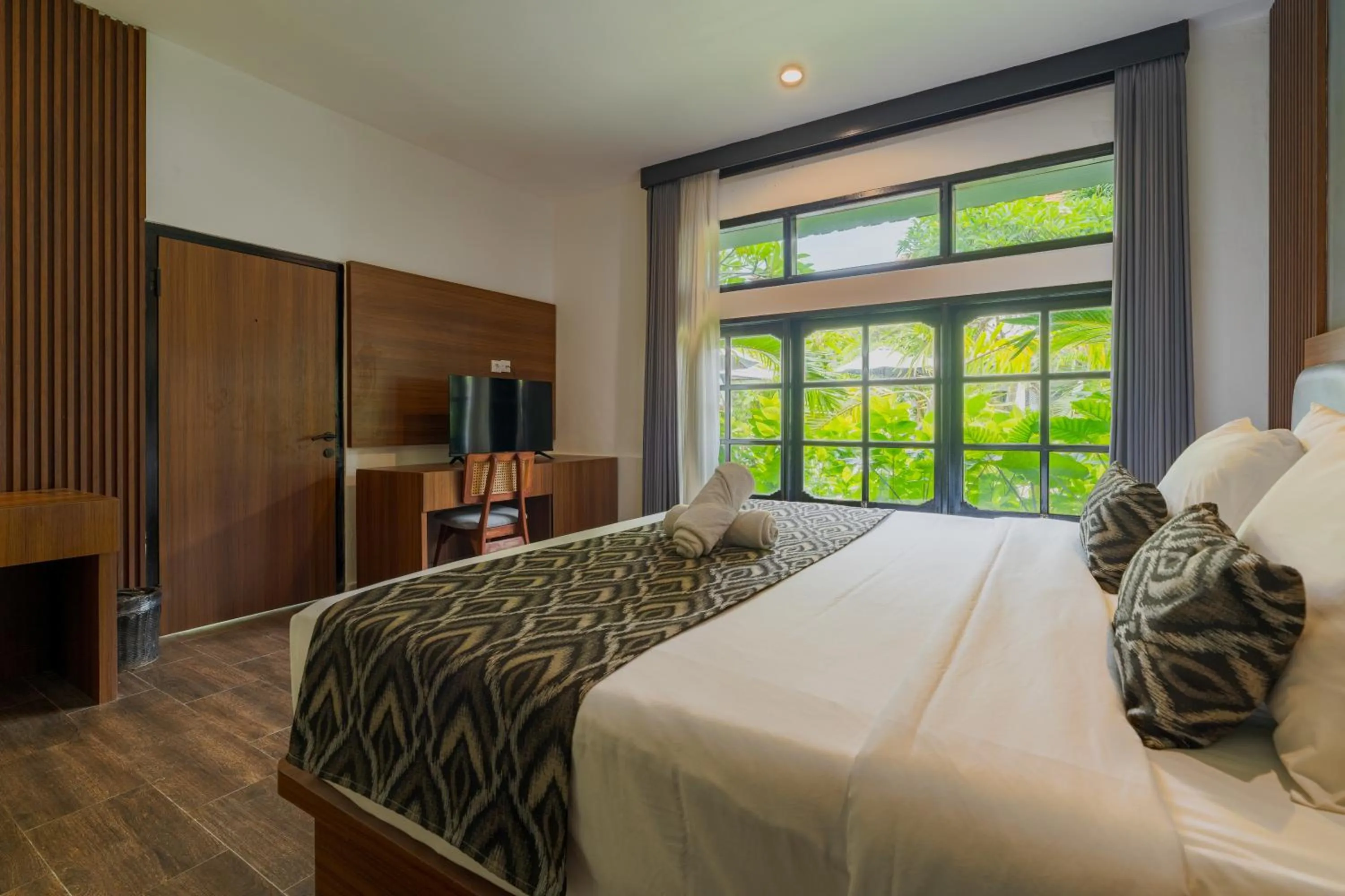 Bed in Casa Wina Kuta by The Wina Resorts