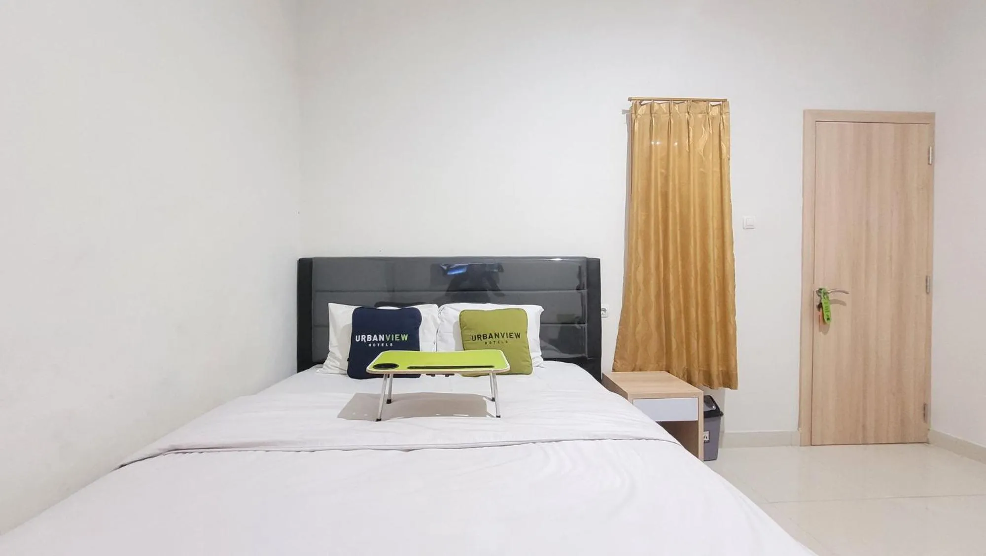 Bed in Urbanview Le Reno Inn Wirobrajan by RedDoorz