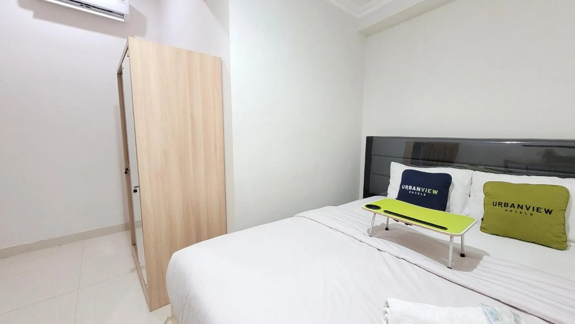 Bed in Urbanview Le Reno Inn Wirobrajan by RedDoorz