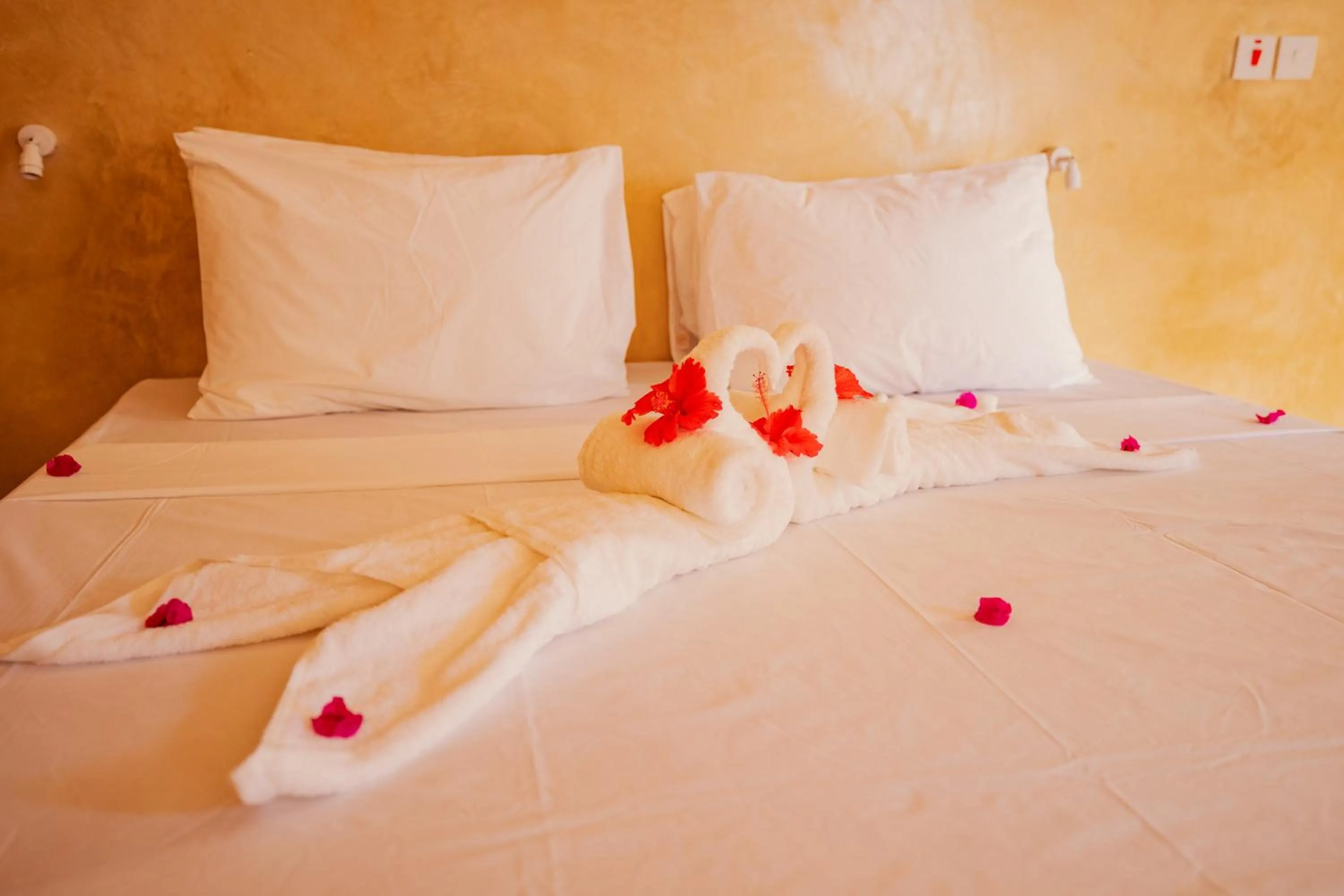 Bed in Mayai Ocean Resort