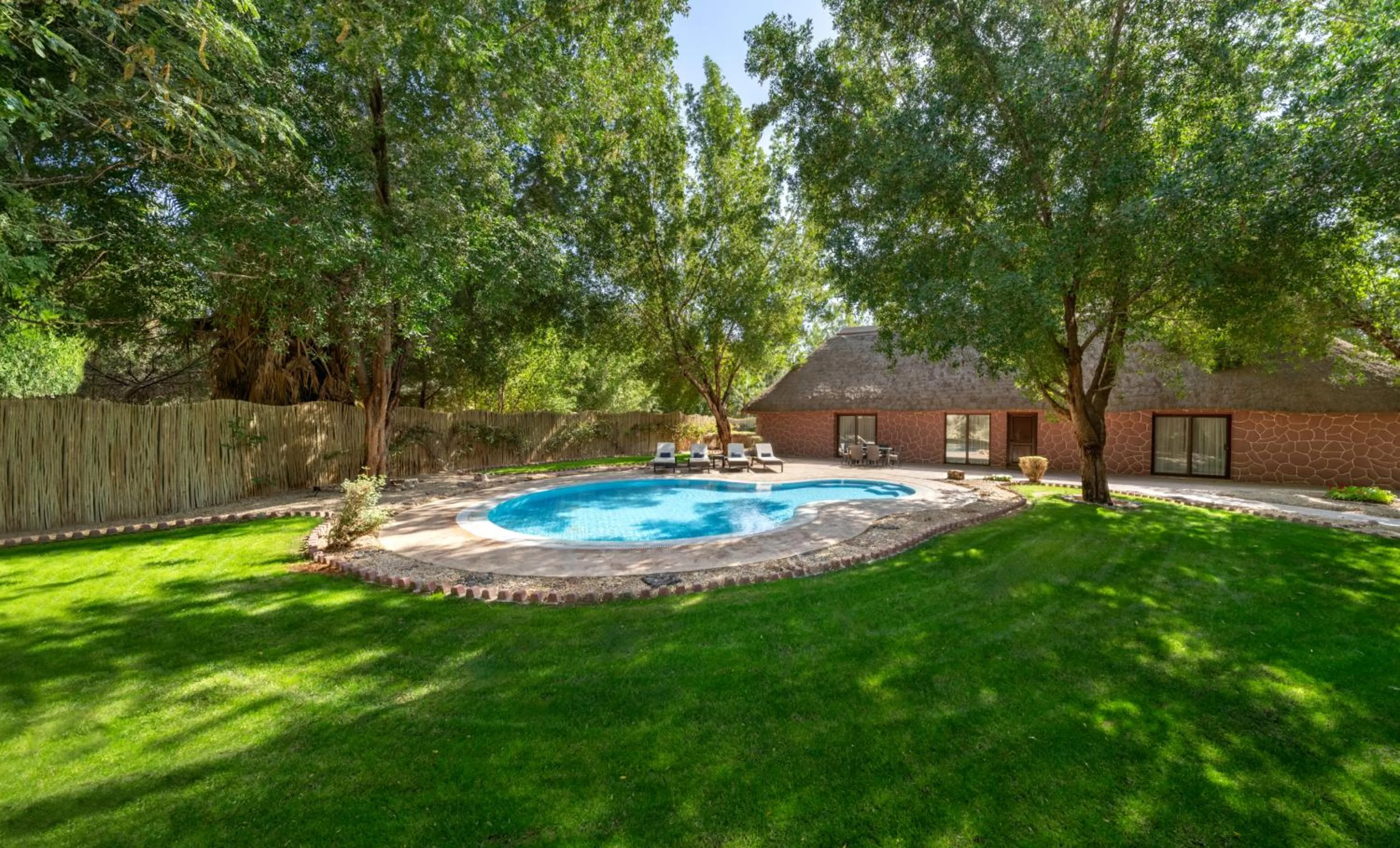 Pool view in Nofa Riyadh, A Radisson Collection Resort