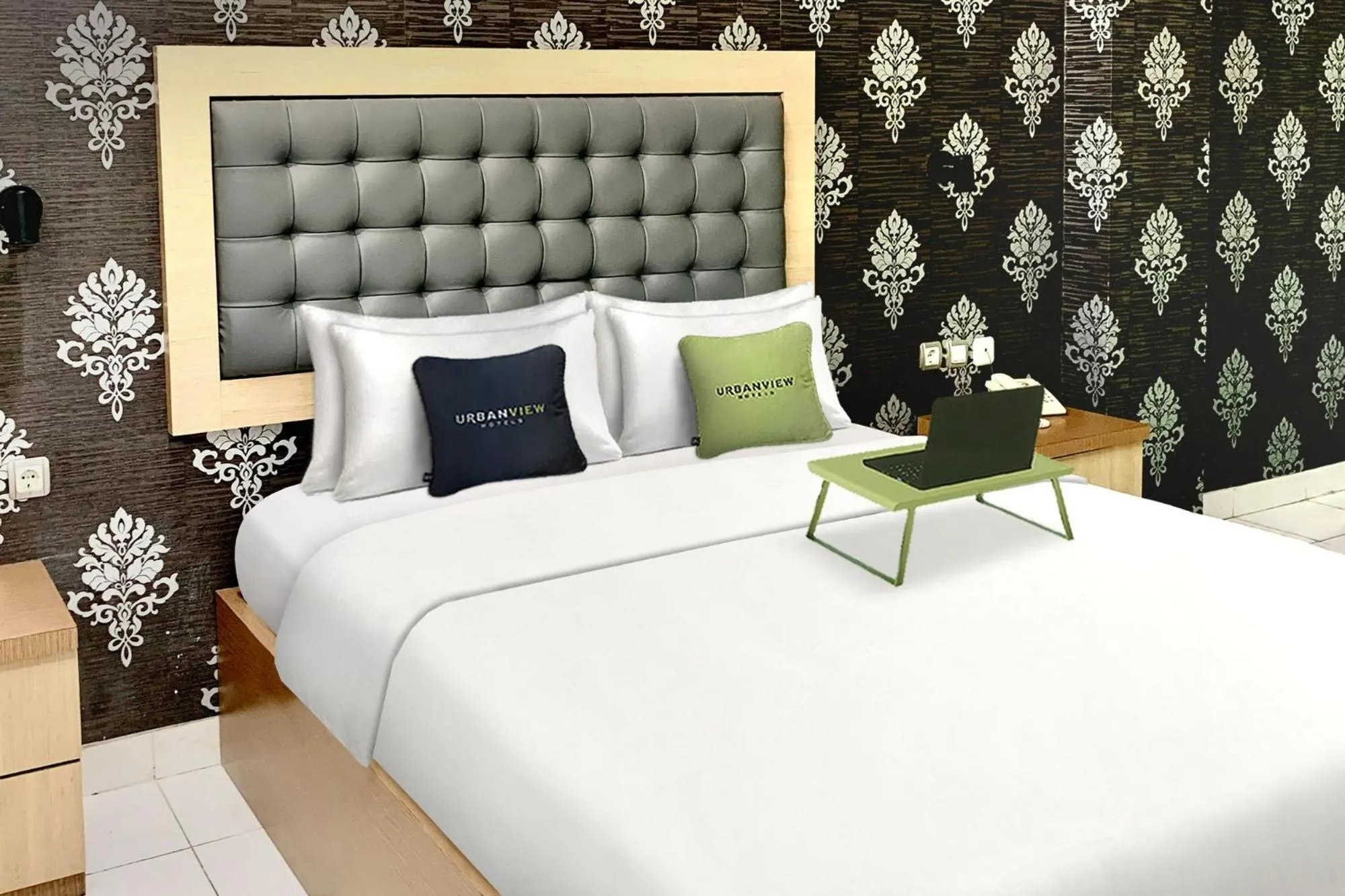 Bed in Urbanview Hotel Niraz Banjarmasin by RedDoorz