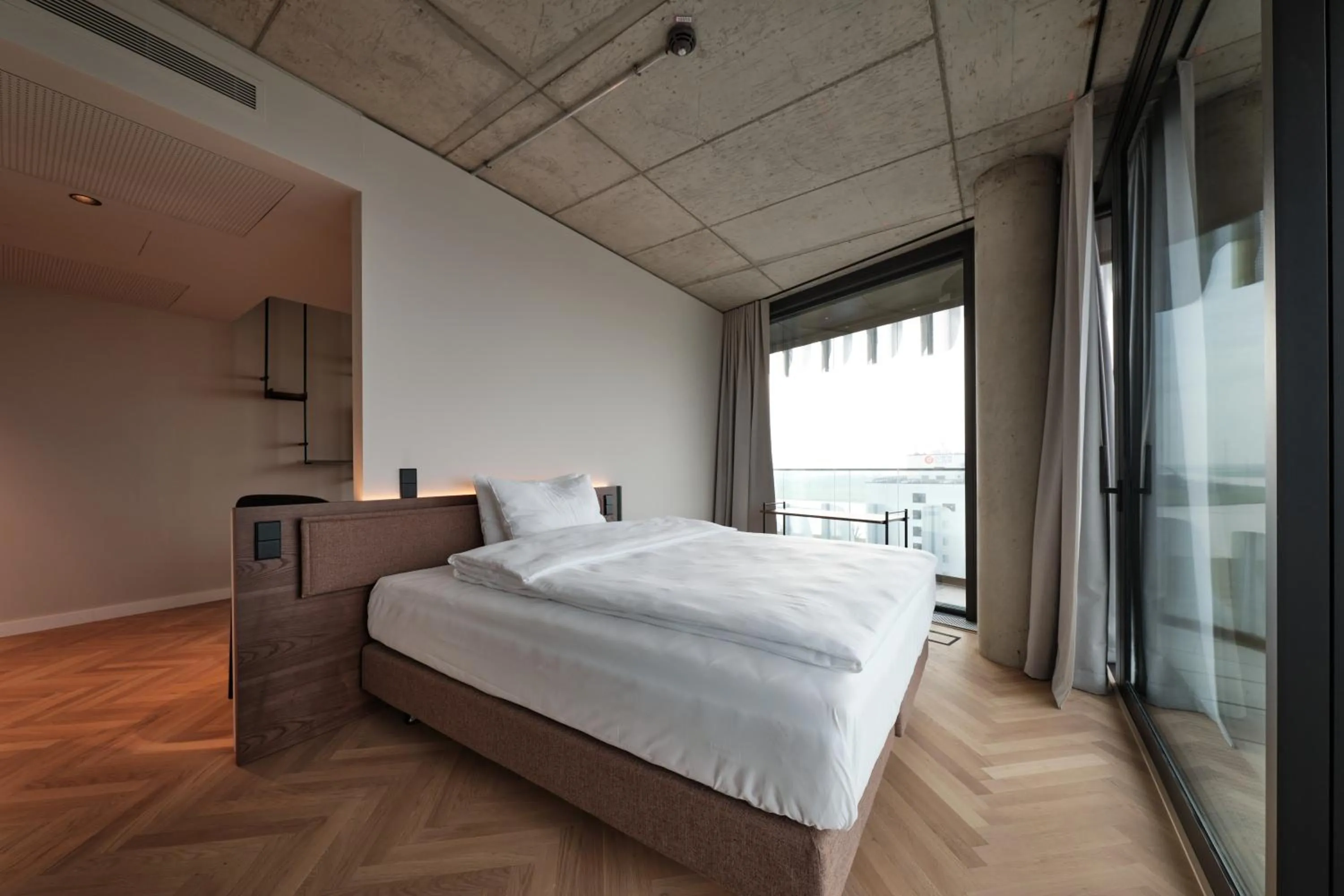 Bed in The Zipper Hotel und Apartments