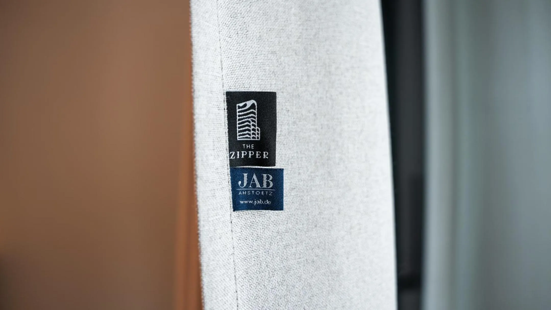 Logo/Certificate/Sign in The Zipper Hotel und Apartments