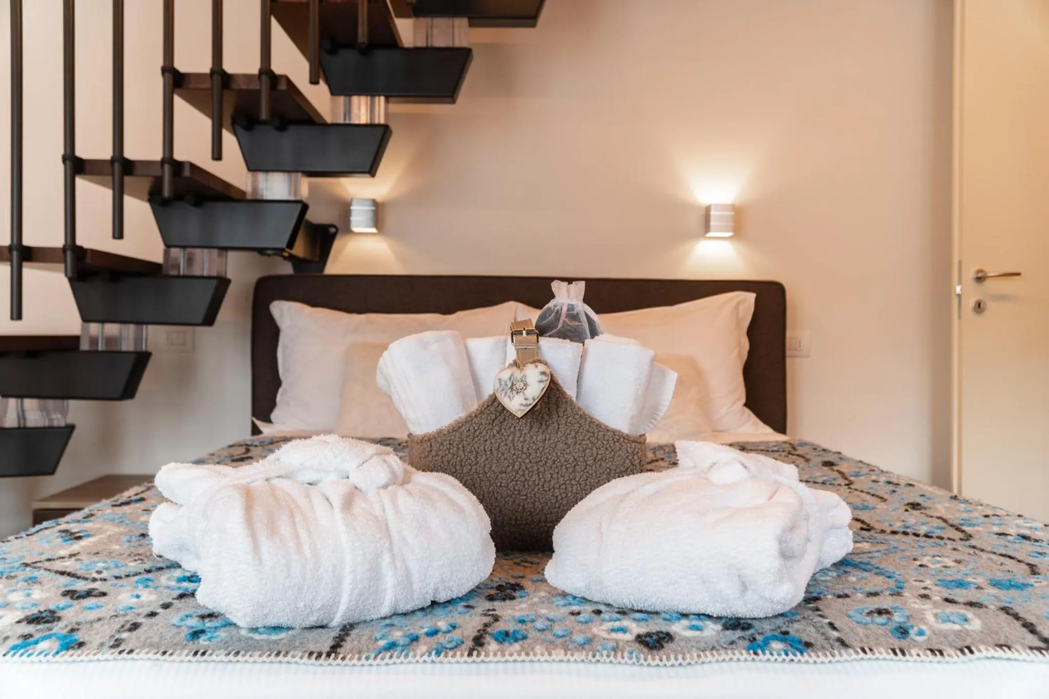 Bedroom in Maison Poluc hotel apartments