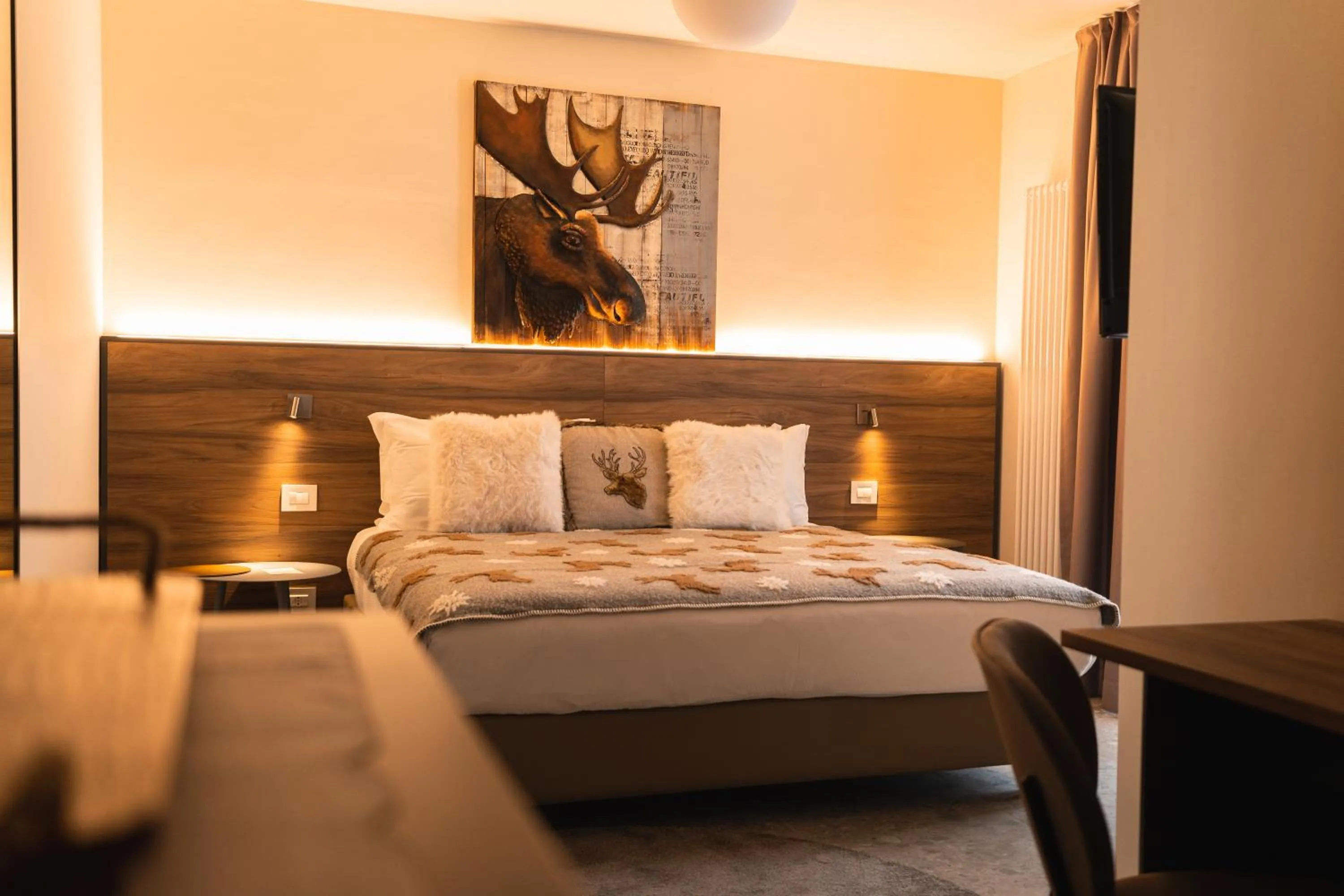 Bed in Maison Poluc hotel apartments
