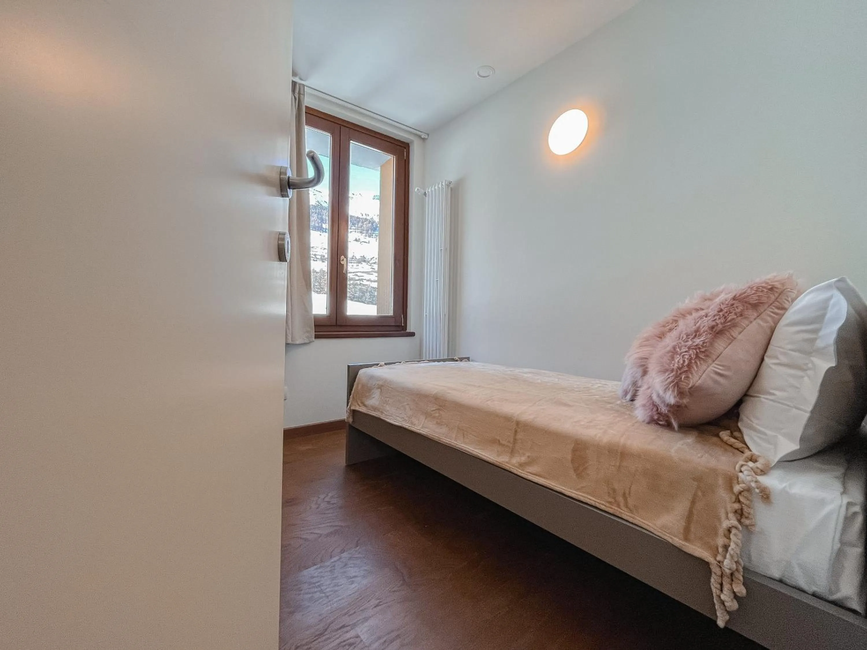 Bedroom in Maison Poluc hotel apartments