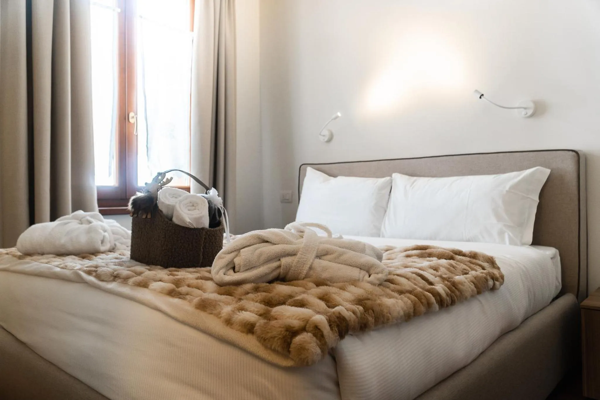 Bedroom in Maison Poluc hotel apartments