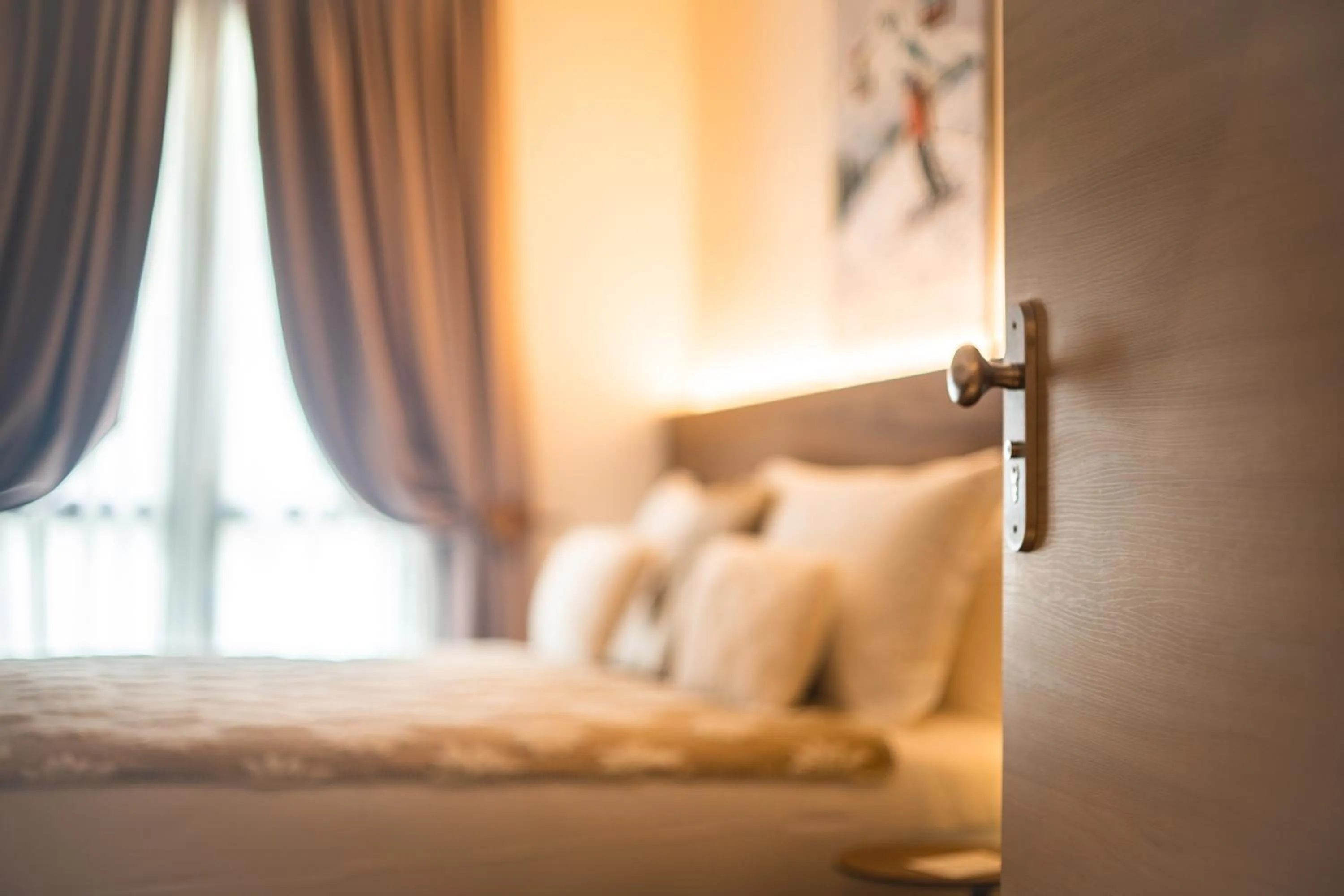 Bed in Maison Poluc hotel apartments