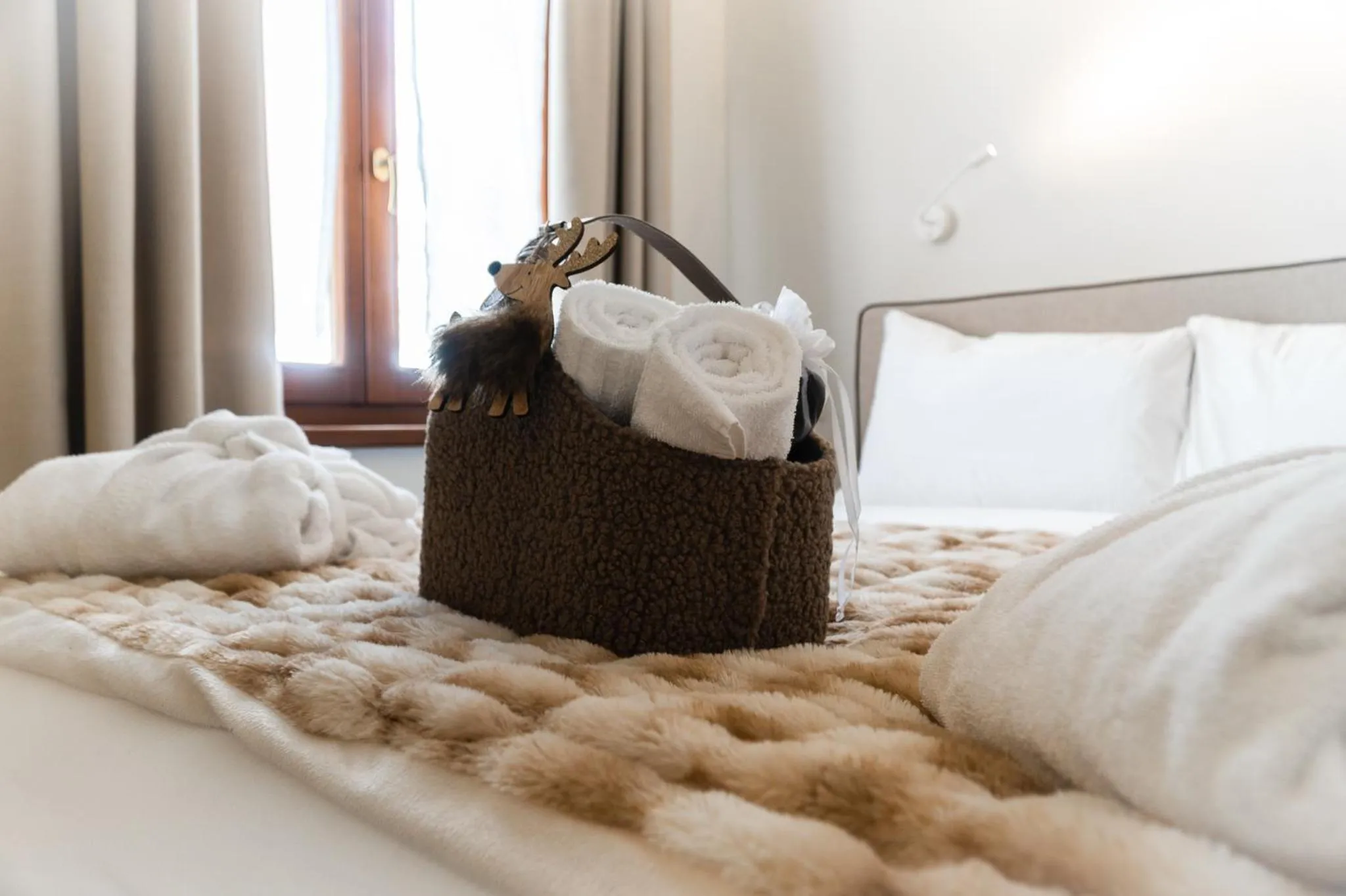 Bed in Maison Poluc hotel apartments