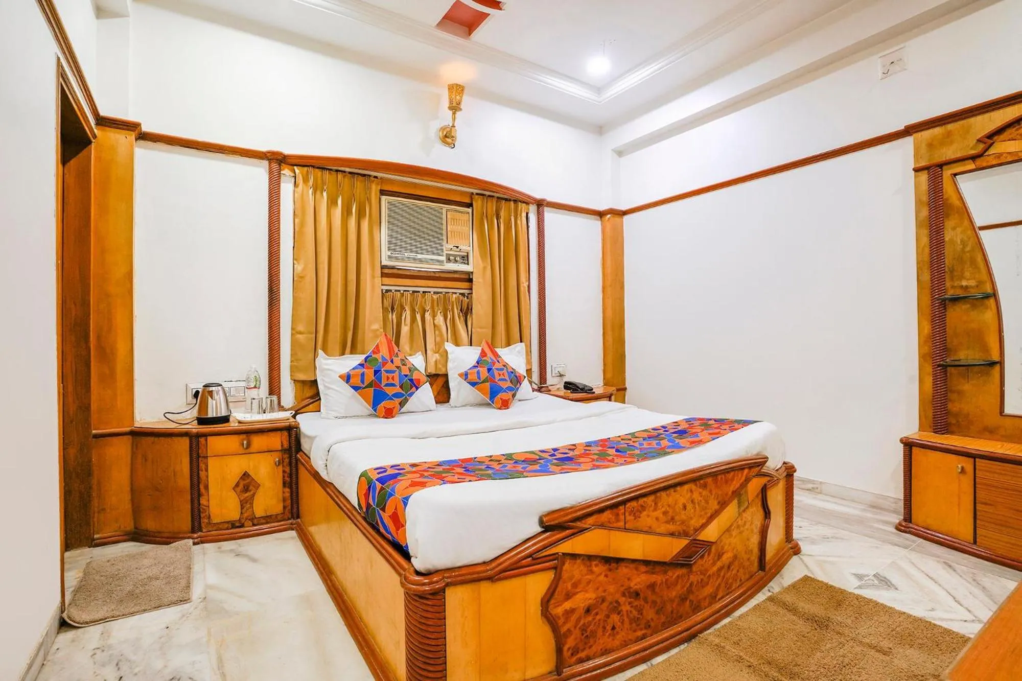 Bed in FabHotel Rest & Peace