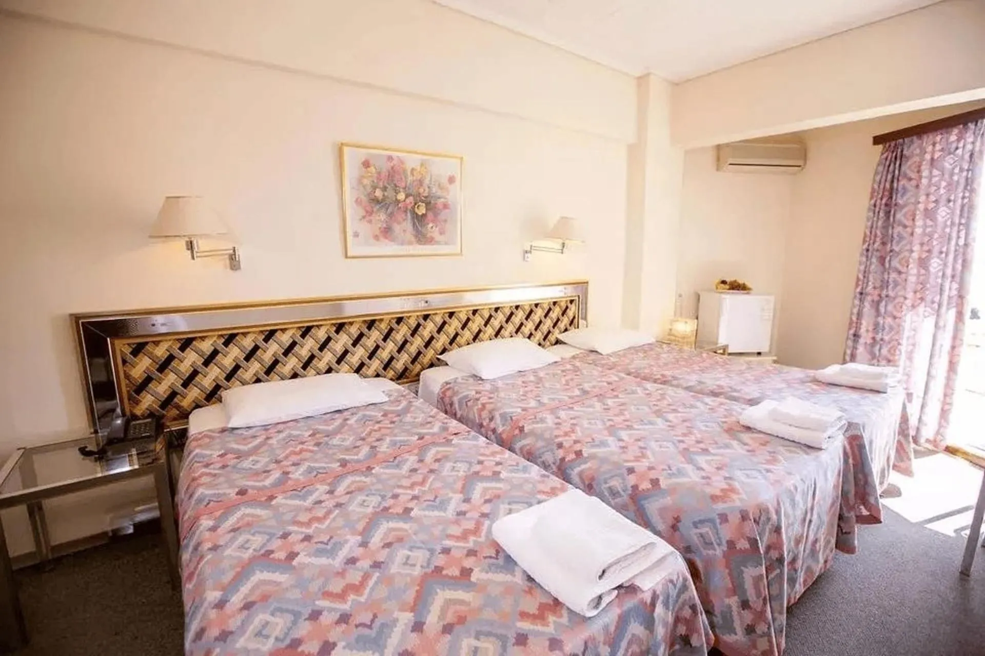 Bed in Hotel Theoxenia