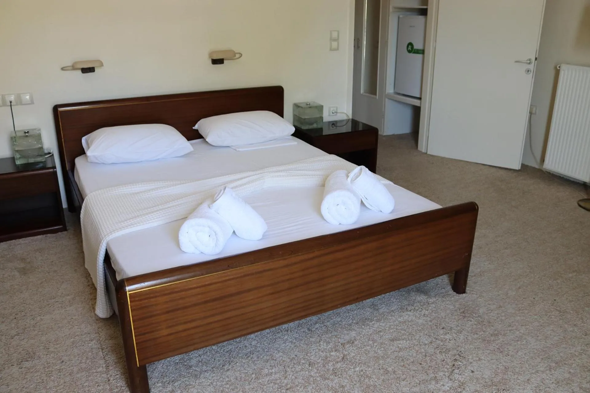 Bed in Hotel Theoxenia