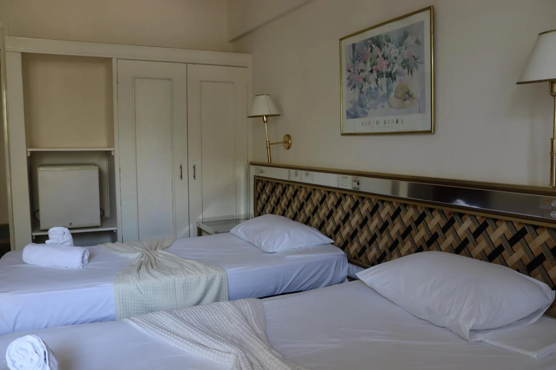 Bed in Hotel Theoxenia