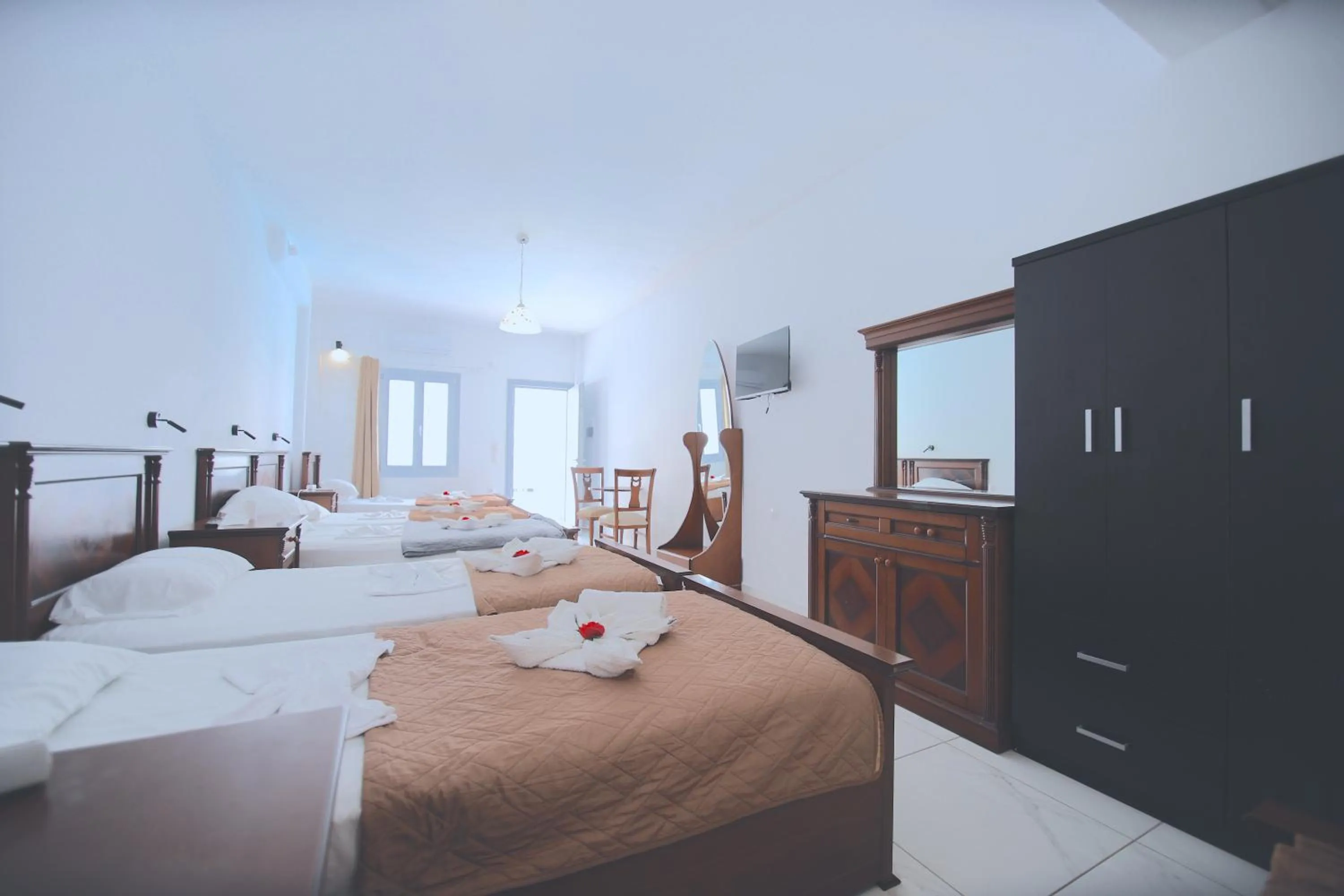 Photo of the whole room, Bed in Dodomar Selections