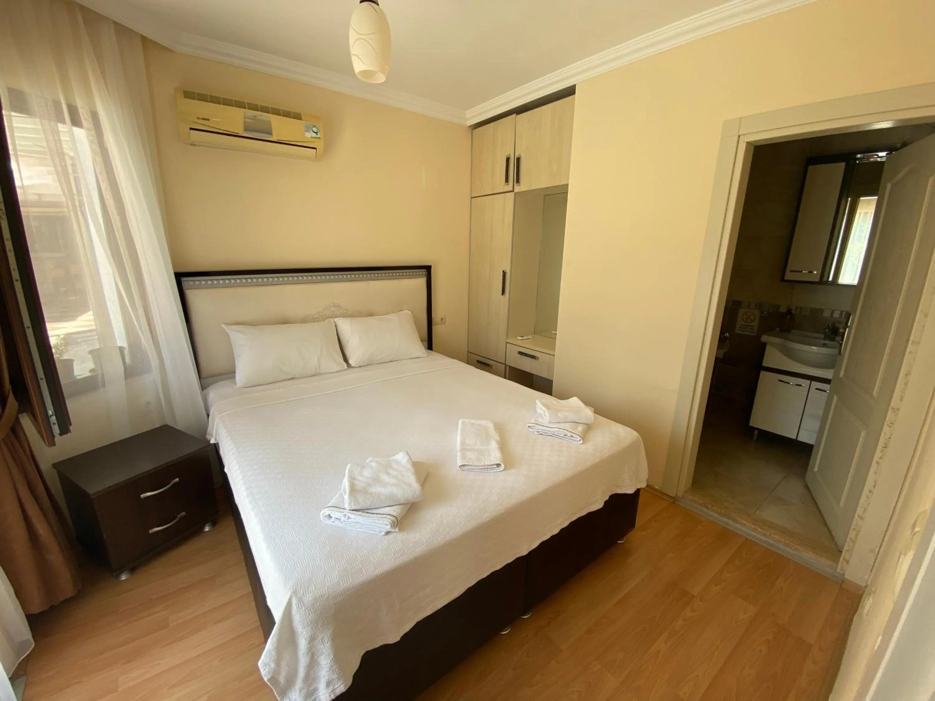 Bed in Tulip Apart Hotel