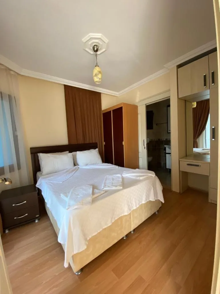 Bed in Tulip Apart Hotel