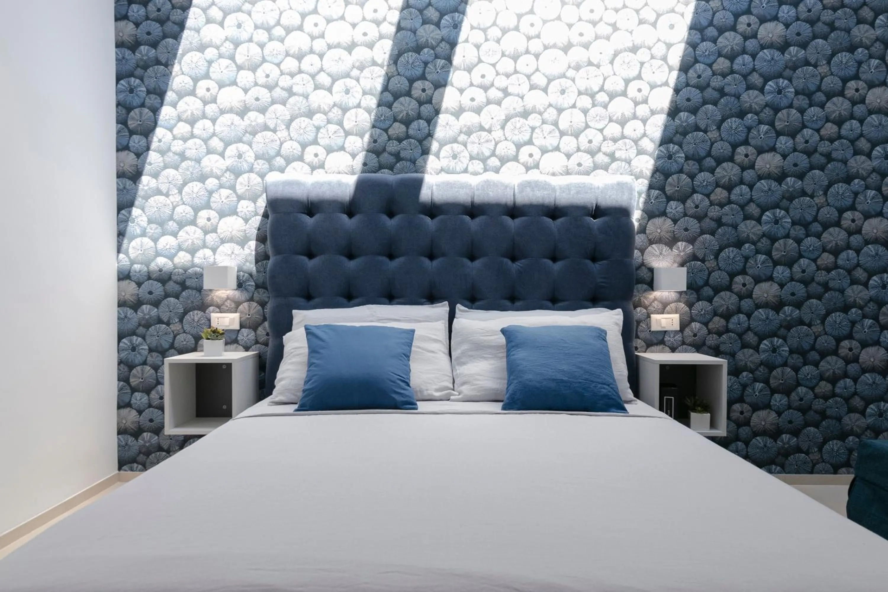 Bed in Stellaris Apartrooms