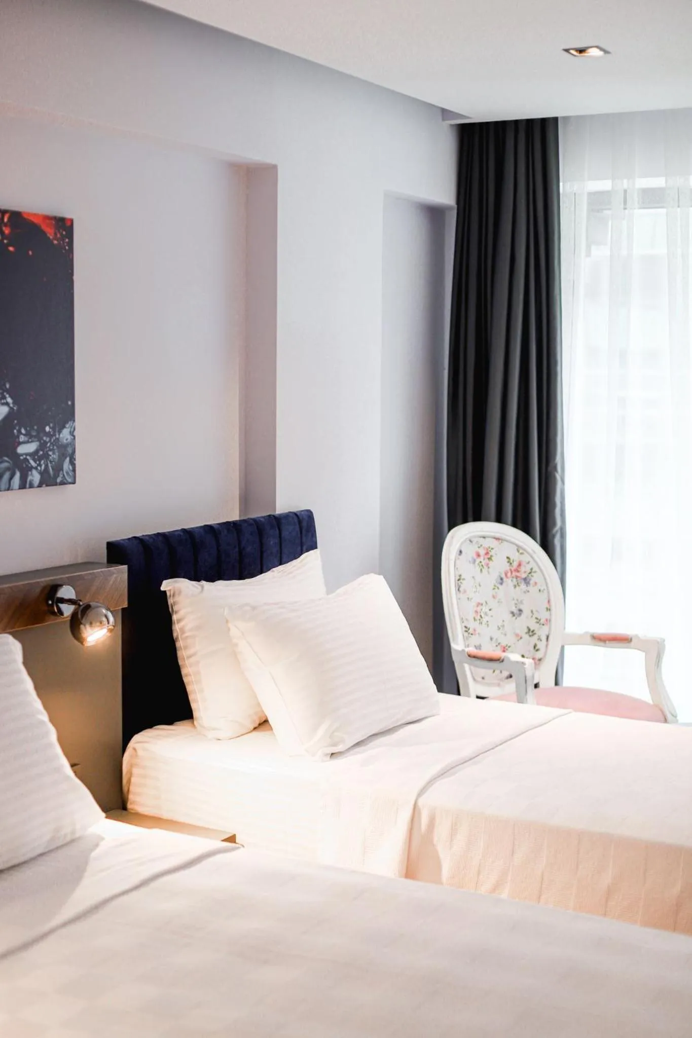 Bed in THE ROYALS HOTEL