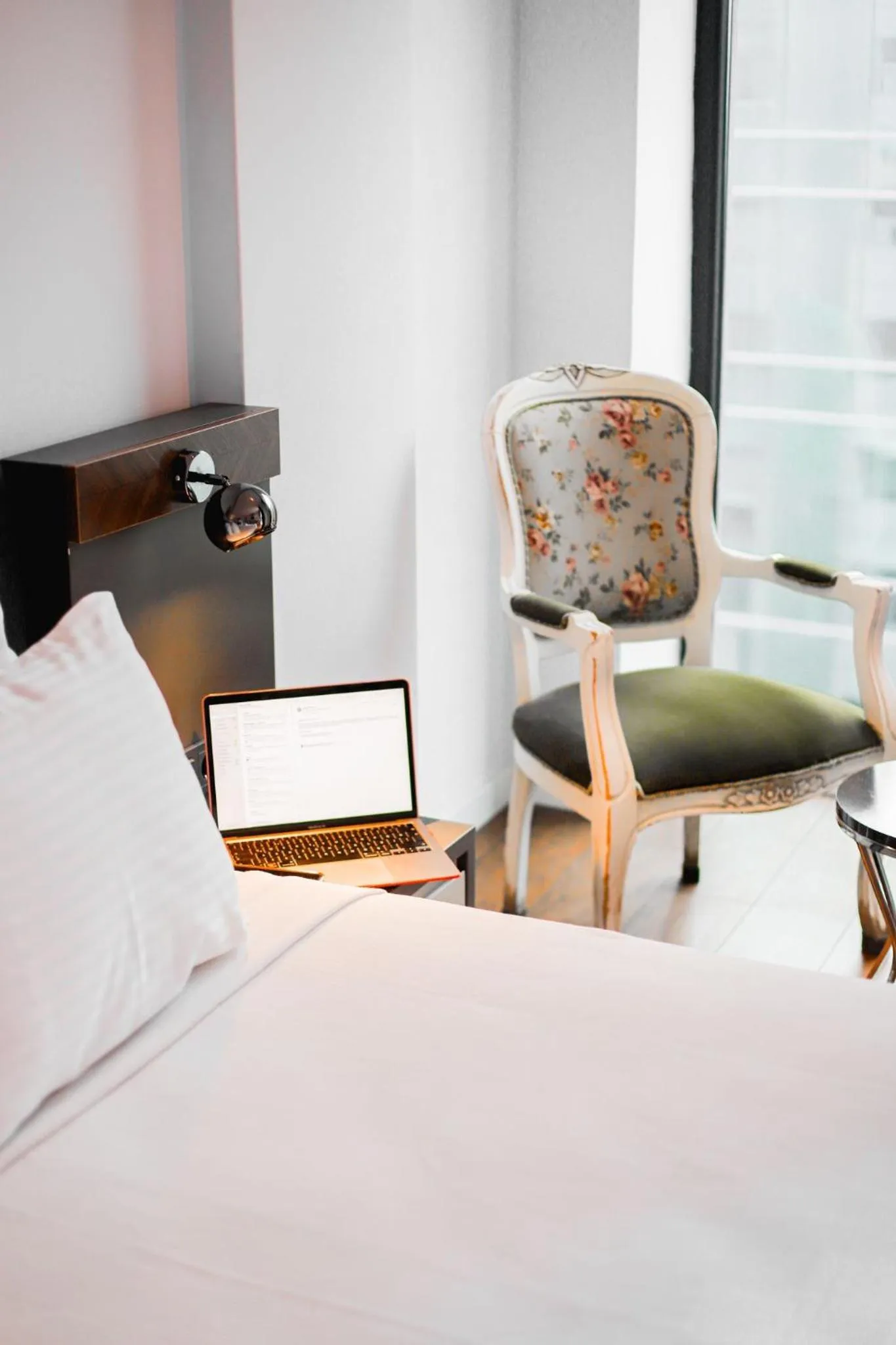 Bed in THE ROYALS HOTEL