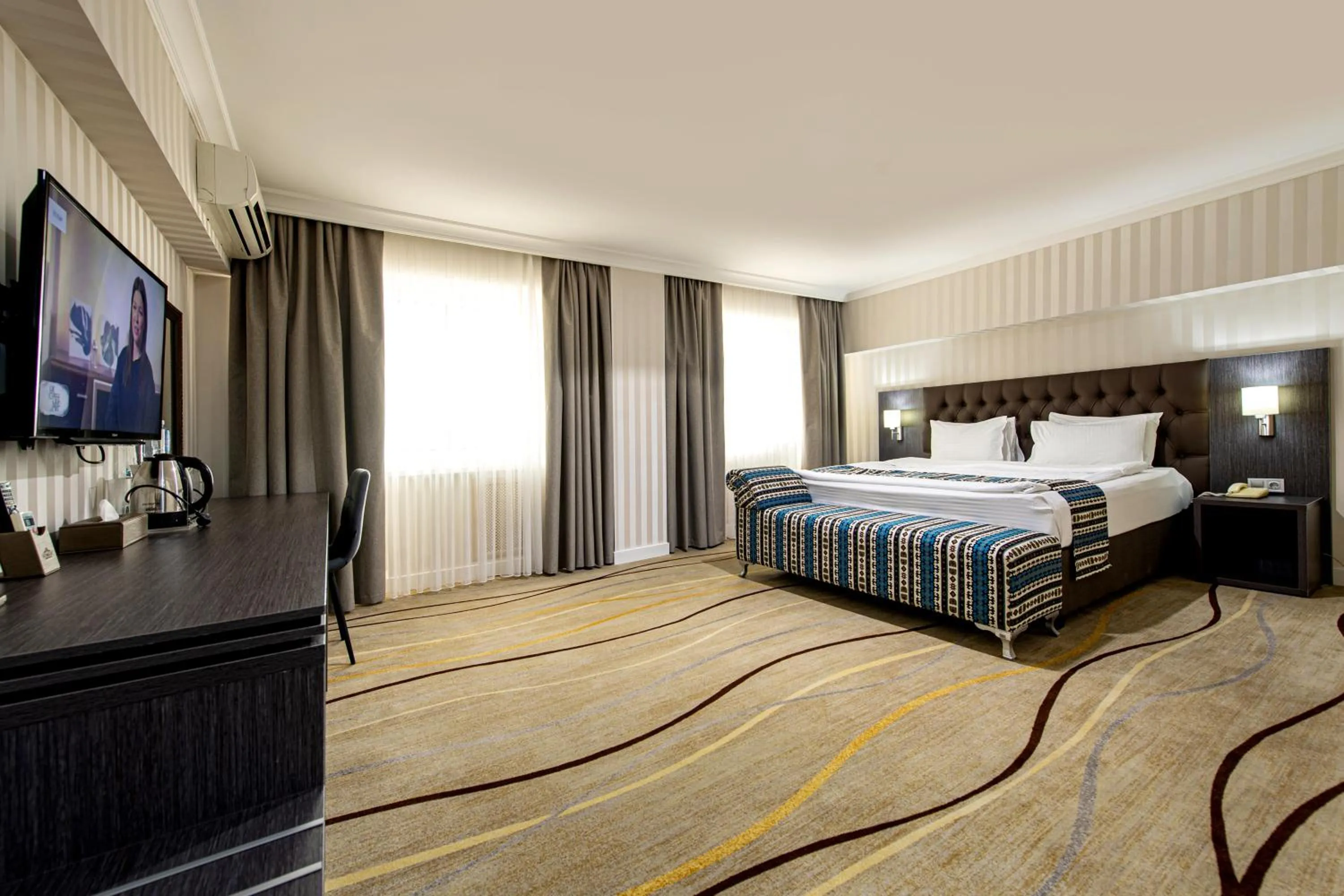 Bed in Shymkent Grand Hotel