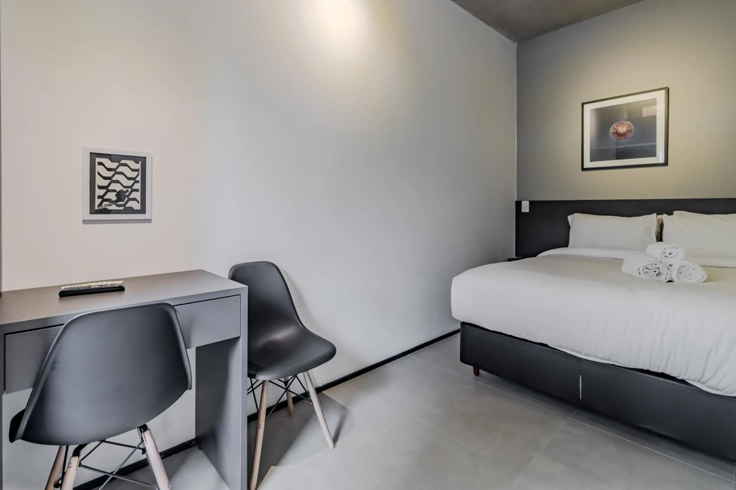 Seating area, Bed in 360 VN Ueno by Housi