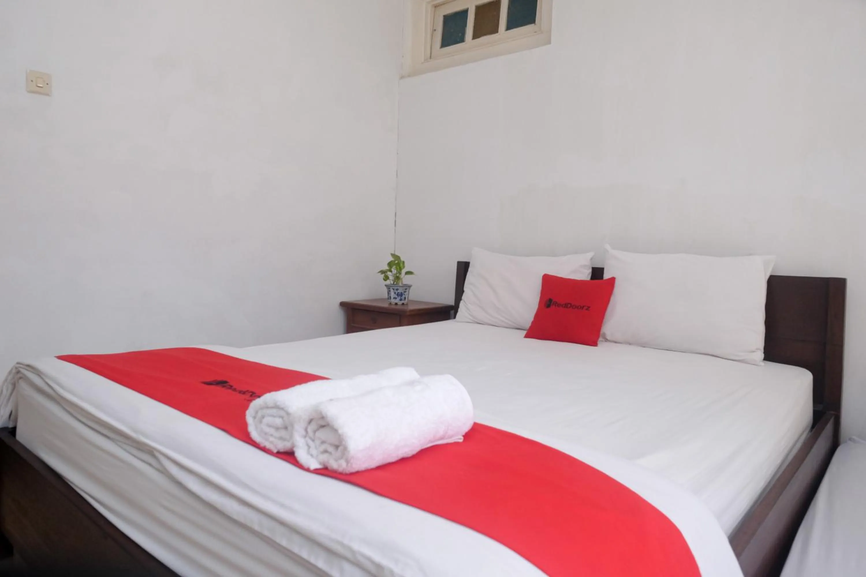 Bedroom, Bed in Reddoorz Syariah near Wijilan Yogyakarta