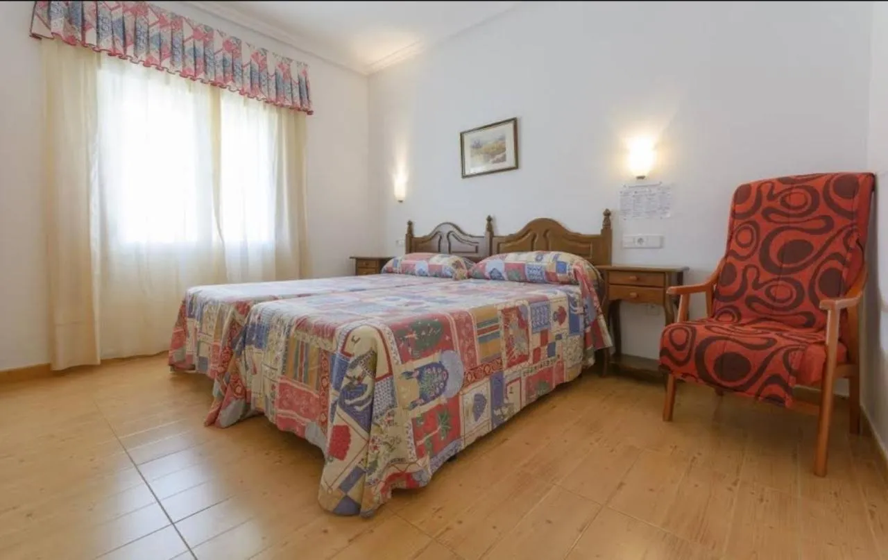 Bed in Hotel La Glorieta