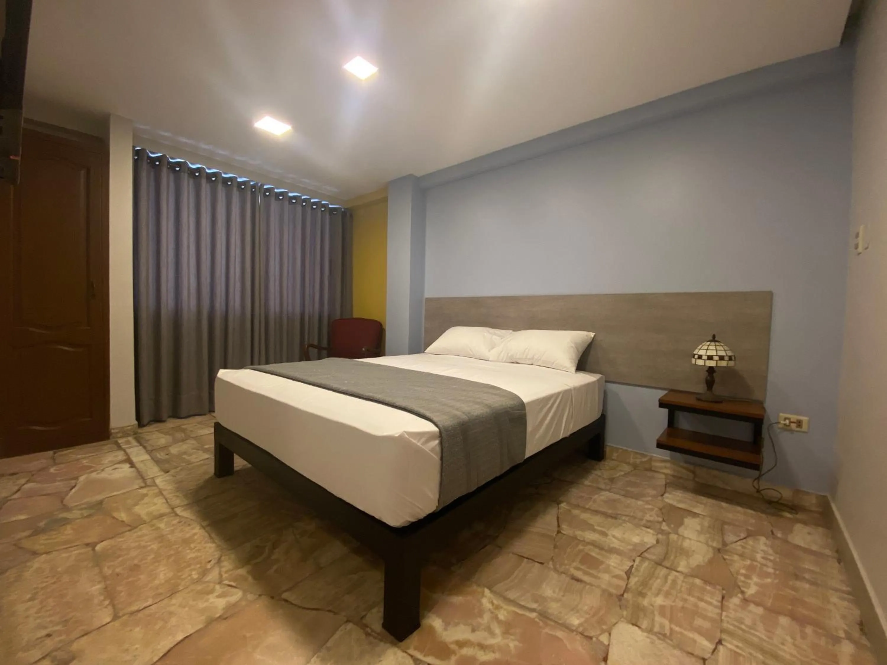 Photo of the whole room, Bed in Izza Hotel