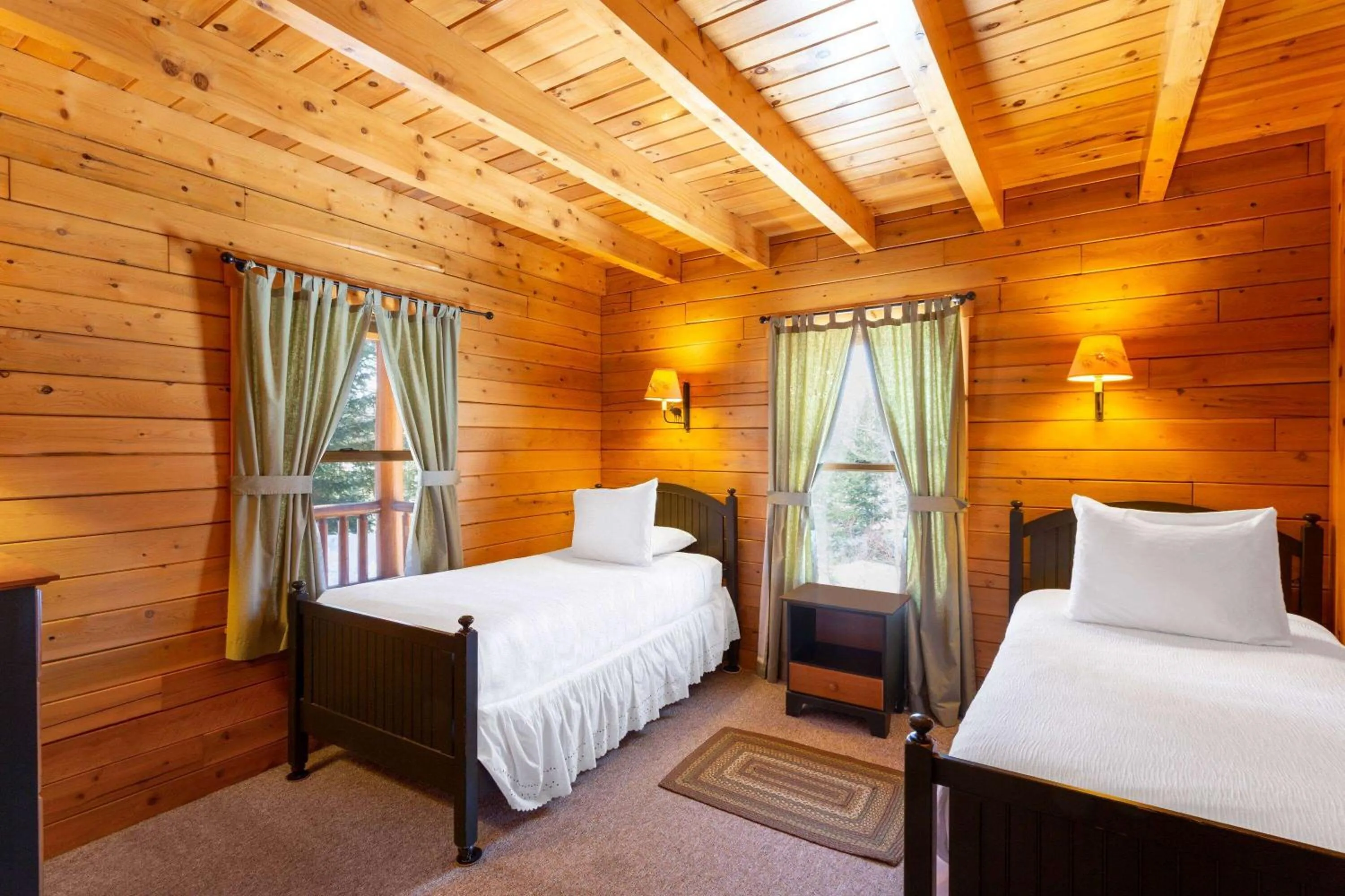 Bed in Rangeley Lake Resort a Ramada by Wyndham