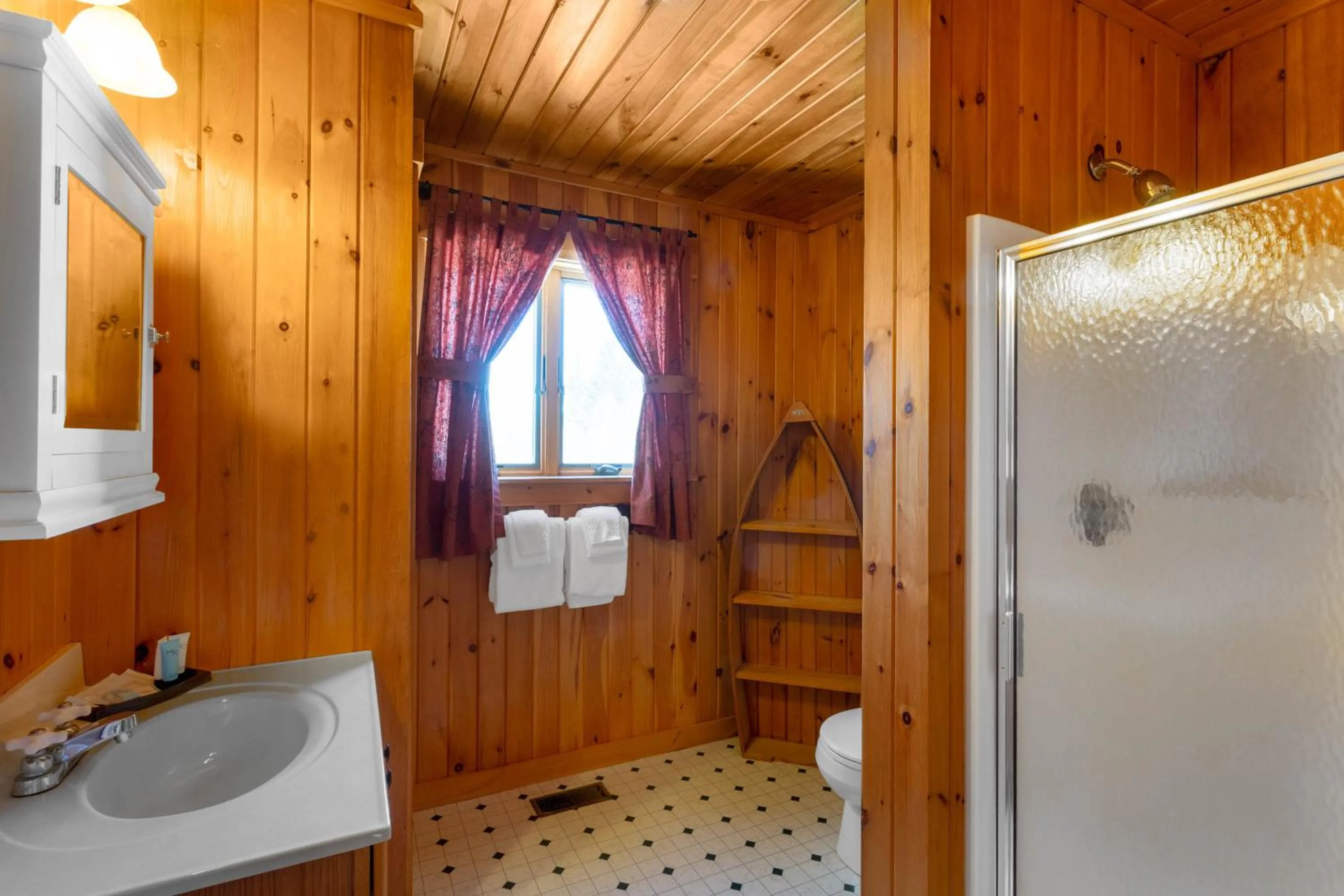 Bathroom in Rangeley Lake Resort a Ramada by Wyndham