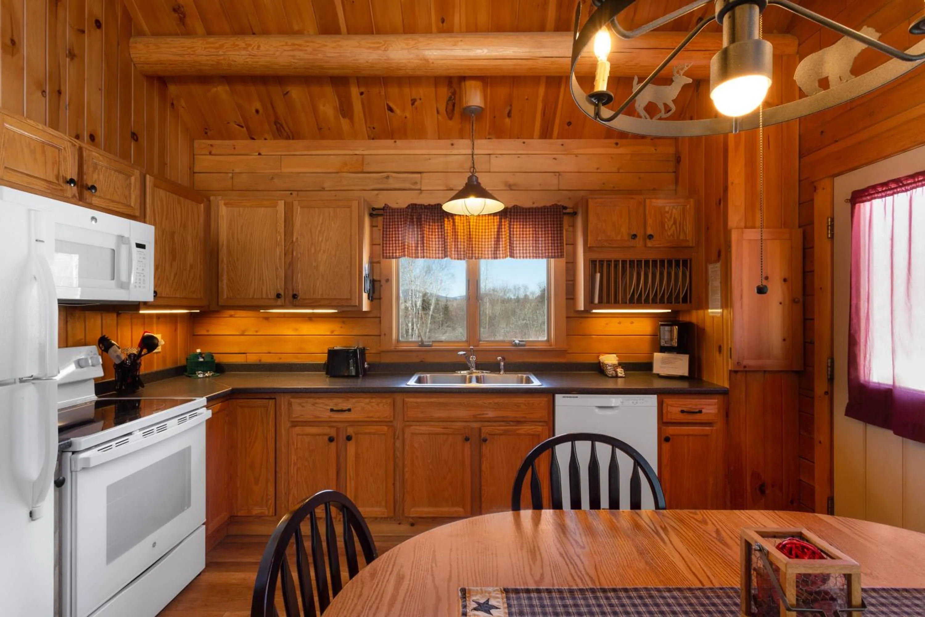 Kitchen or kitchenette in Rangeley Lake Resort a Ramada by Wyndham