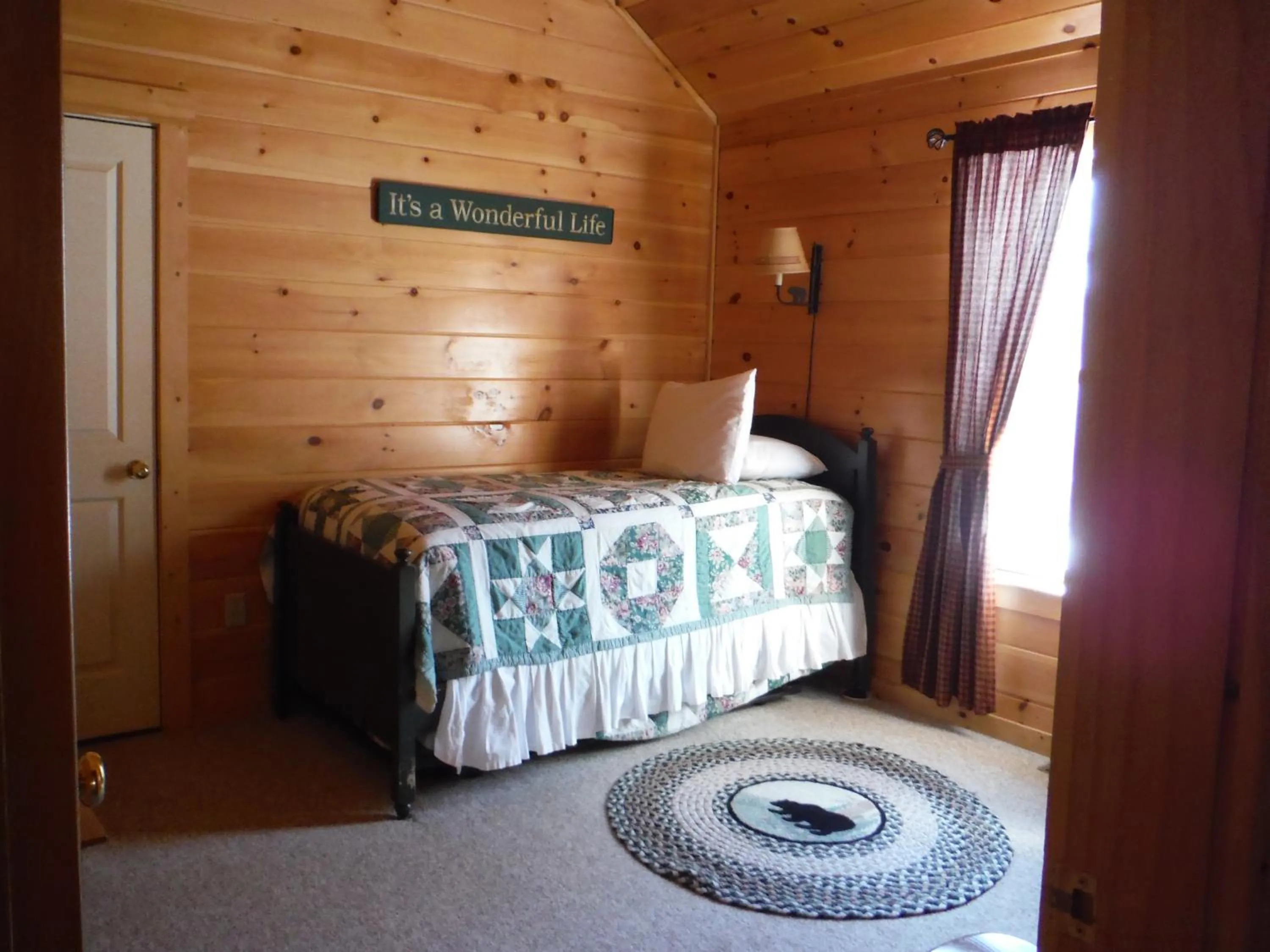 Bed in Rangeley Lake Resort a Ramada by Wyndham