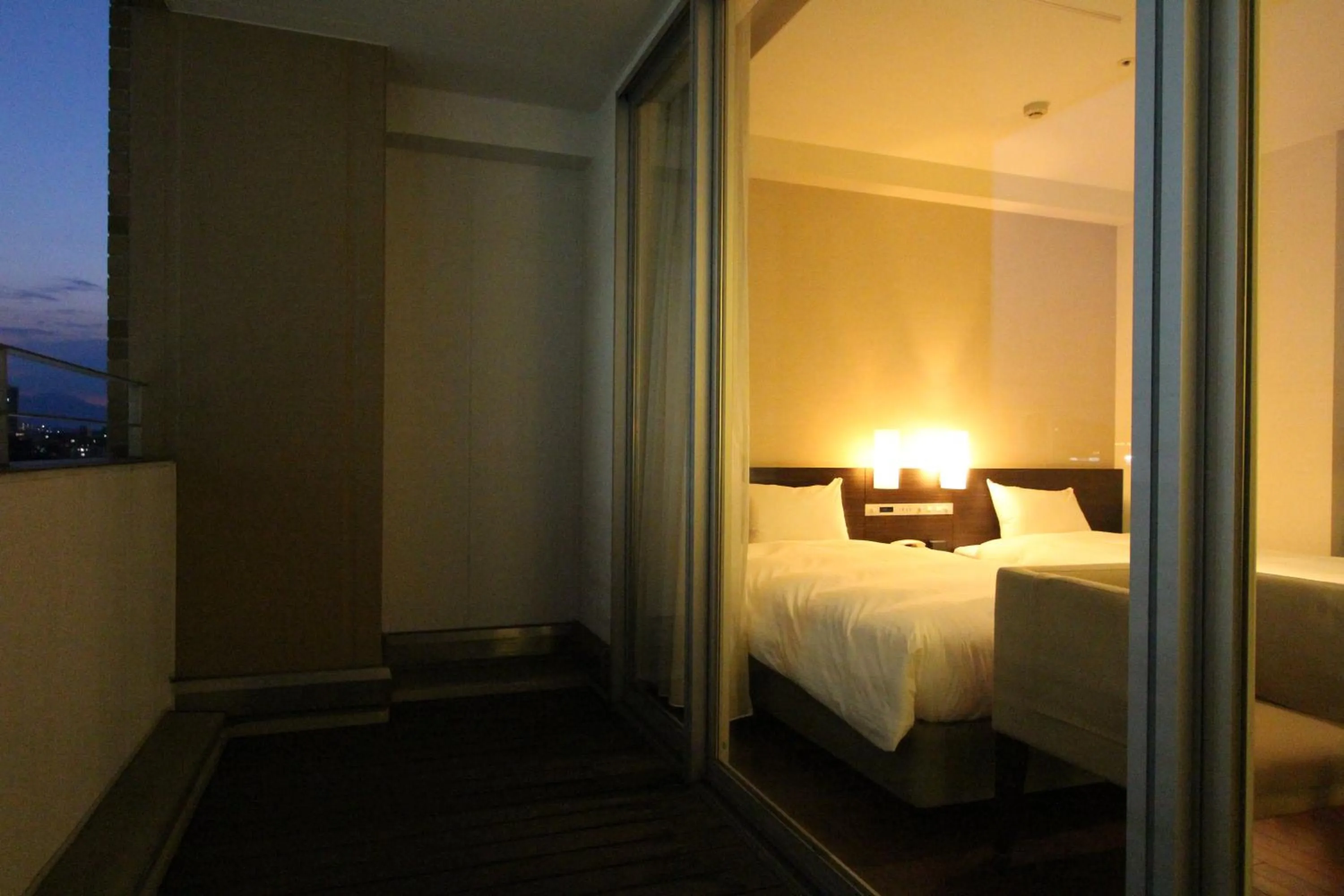 Balcony/Terrace, Bed in KOKO HOTEL Sendai Kotodai Park