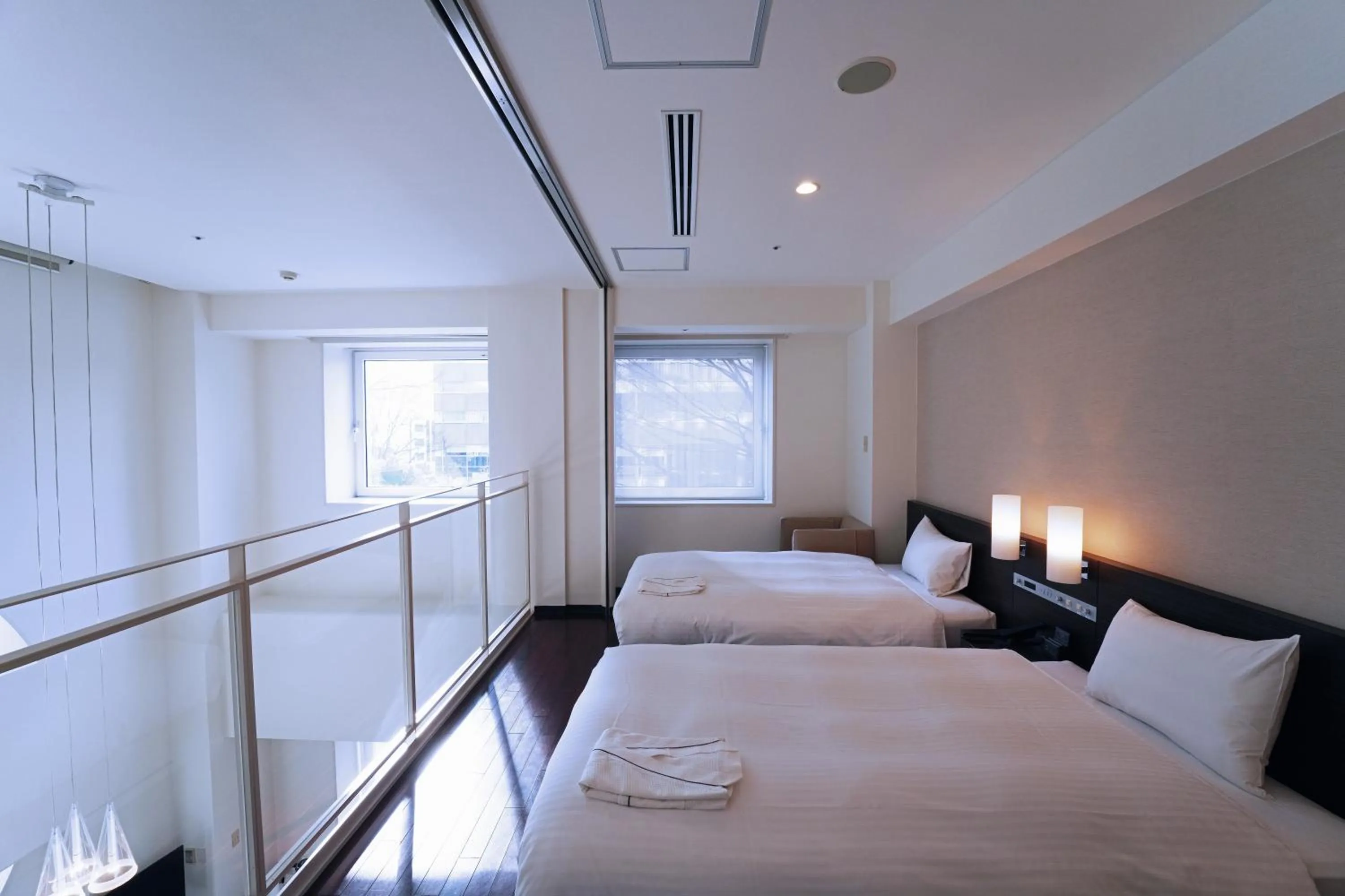 Photo of the whole room, Bed in KOKO HOTEL Sendai Kotodai Park