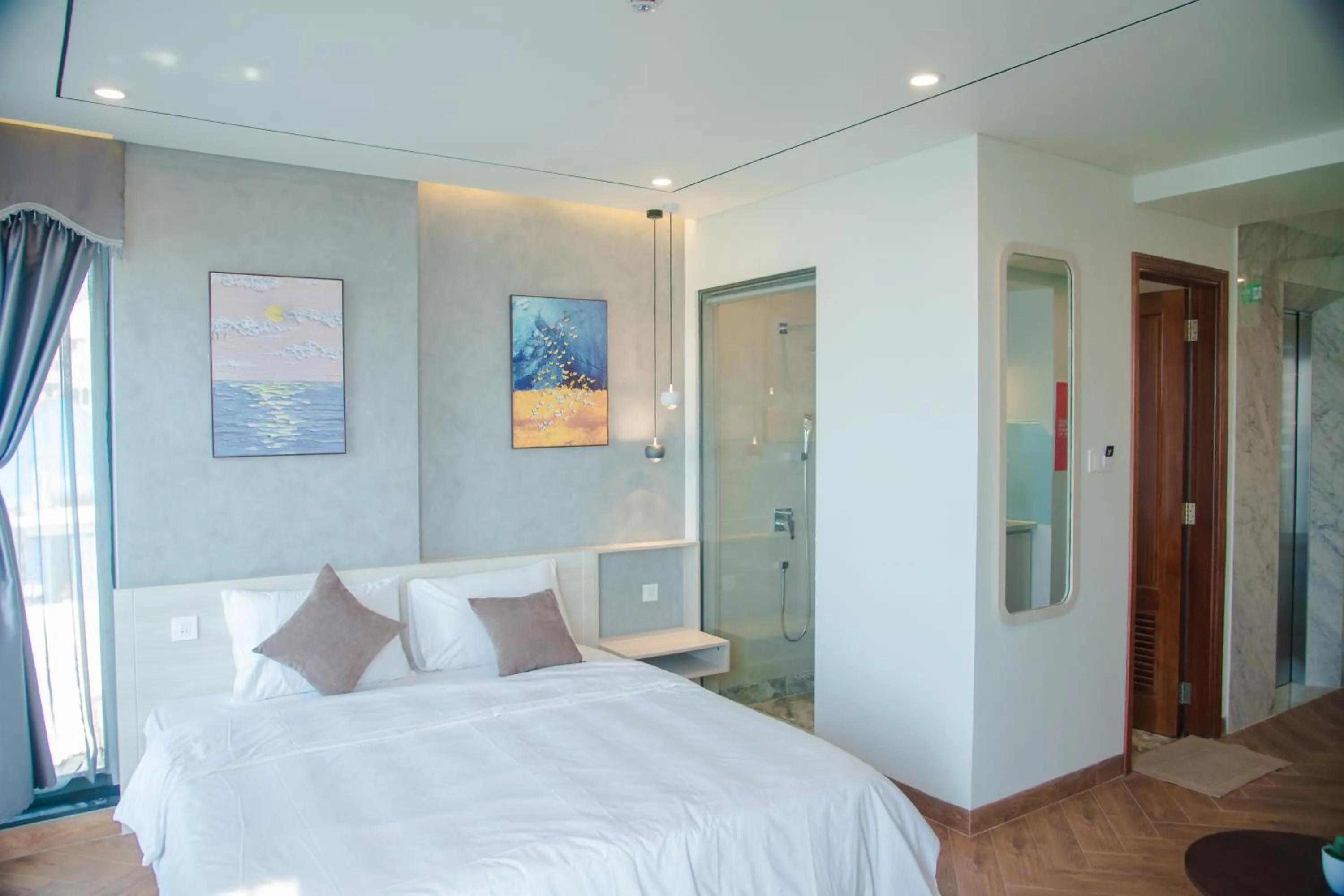 Bed in Y'S Sea House Hotel