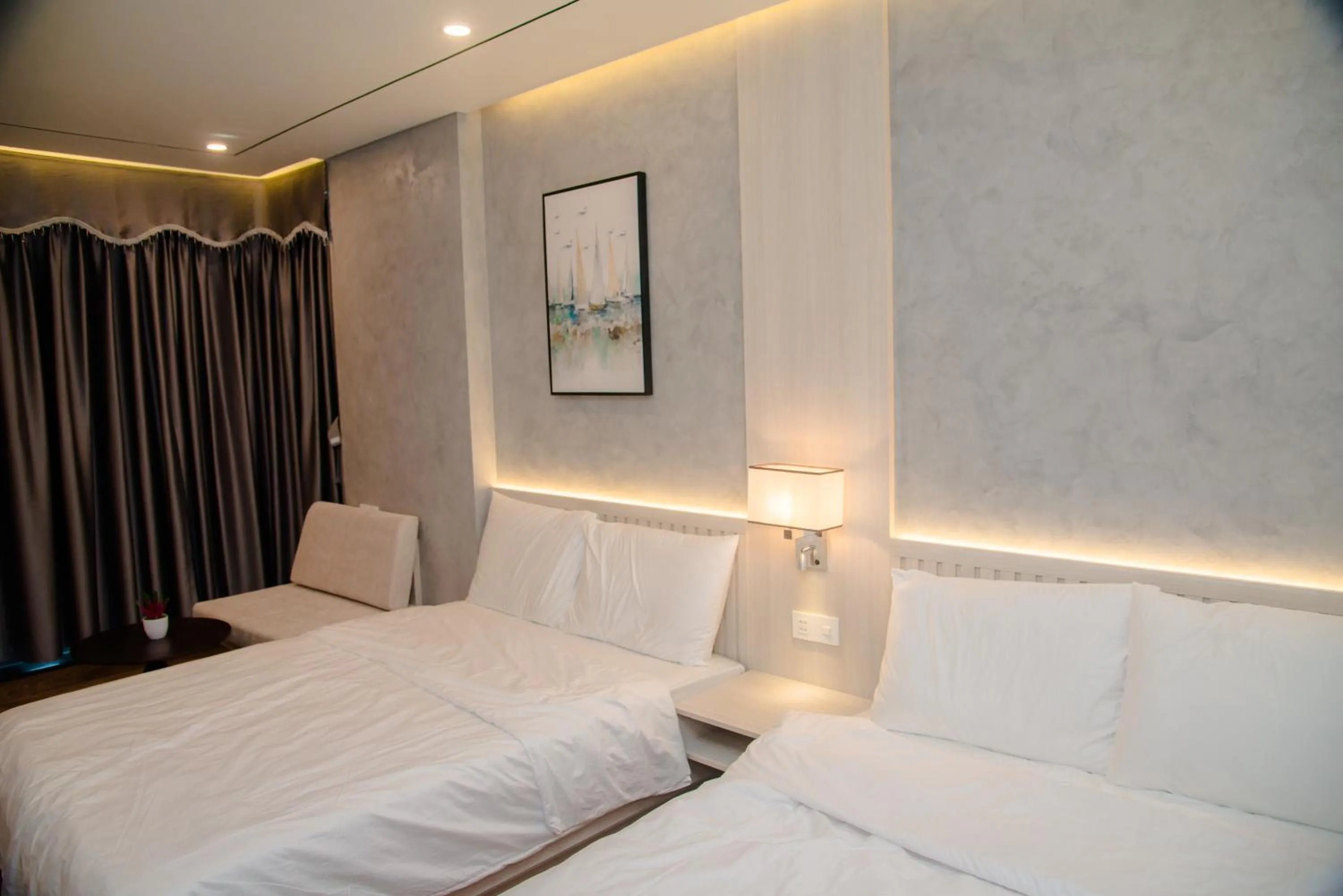 Bed in Y'S Sea House Hotel