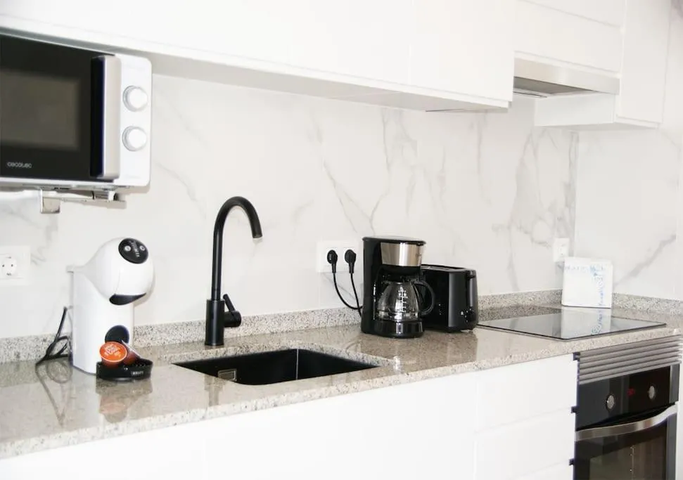 Kitchen or kitchenette in Bungalow frente la playa Cala Capitan ,#PRP002 by Stay Orihuela Costa