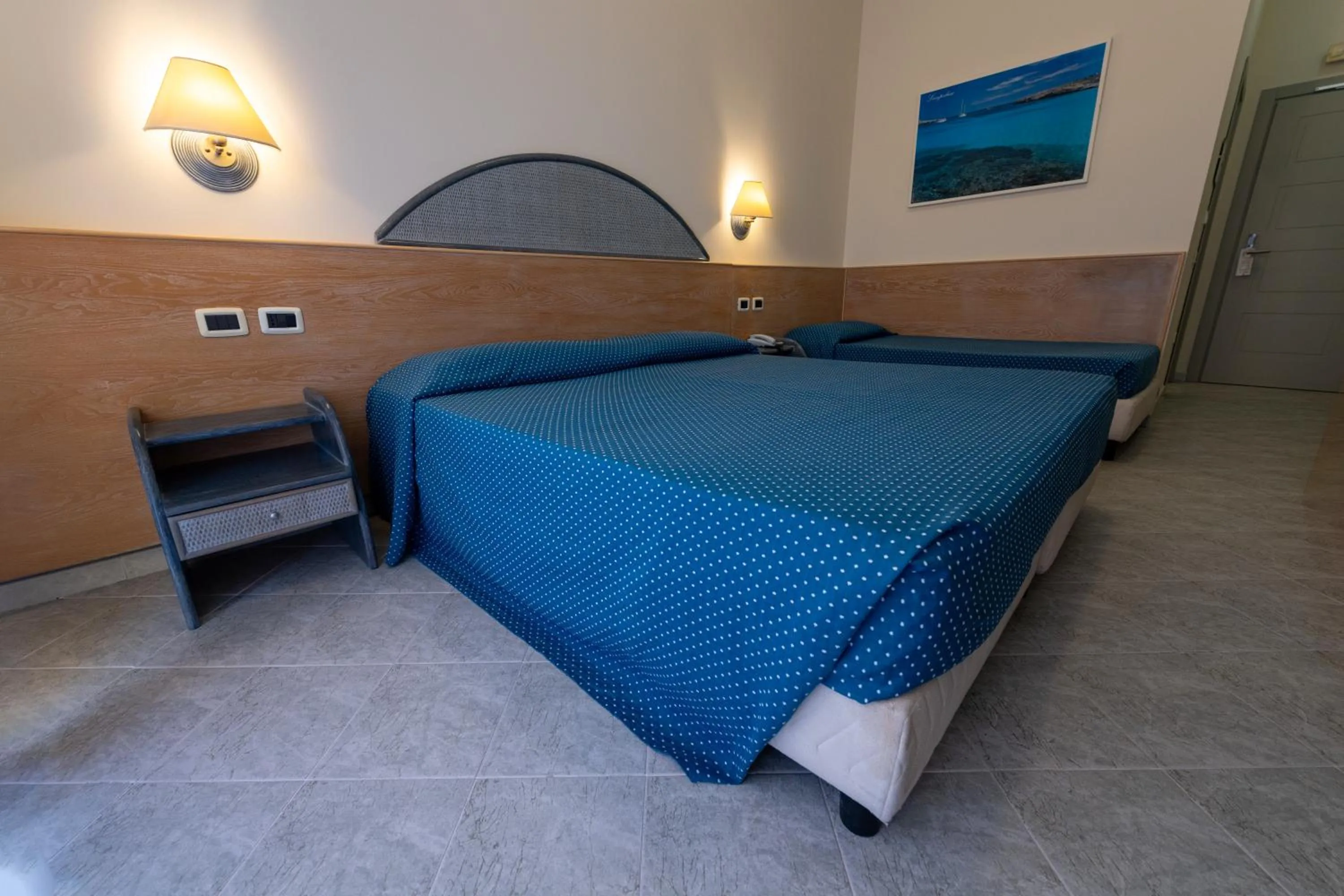 Photo of the whole room, Bed in Hotel Baia Turchese