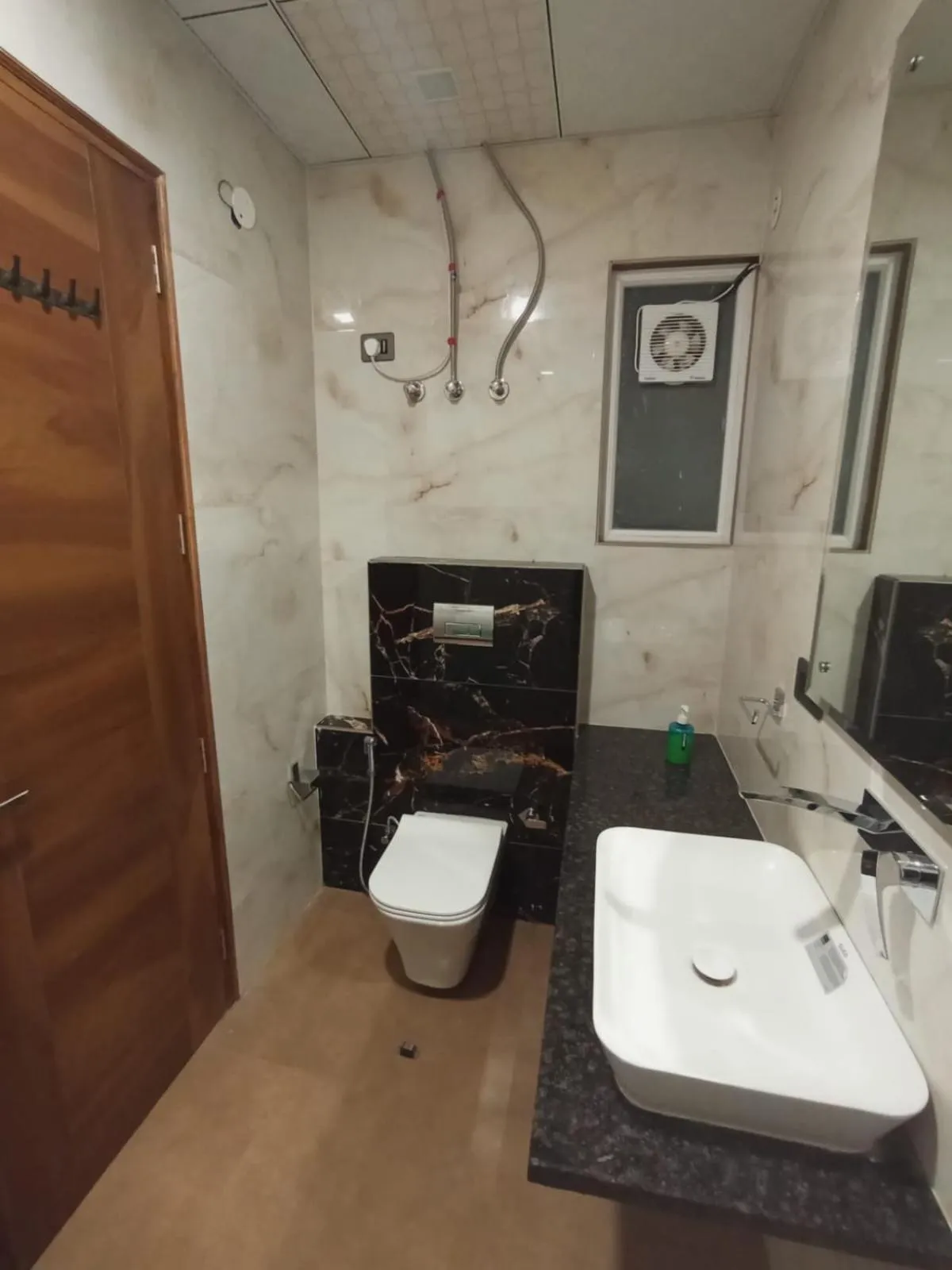 Toilet in Masaga by Qcent, Gurugram