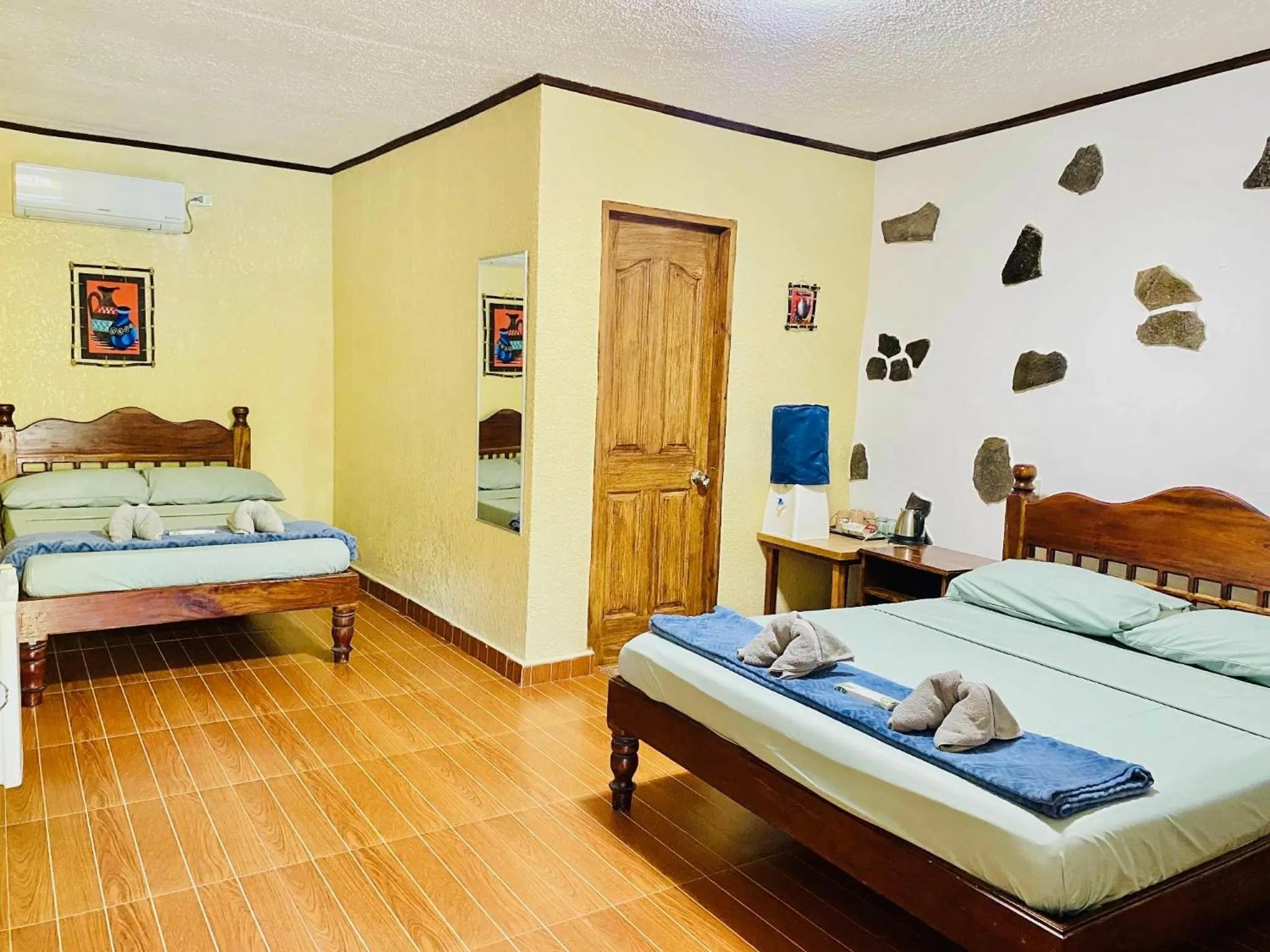 Bed in TipTop Hotel, Resto and Delishop