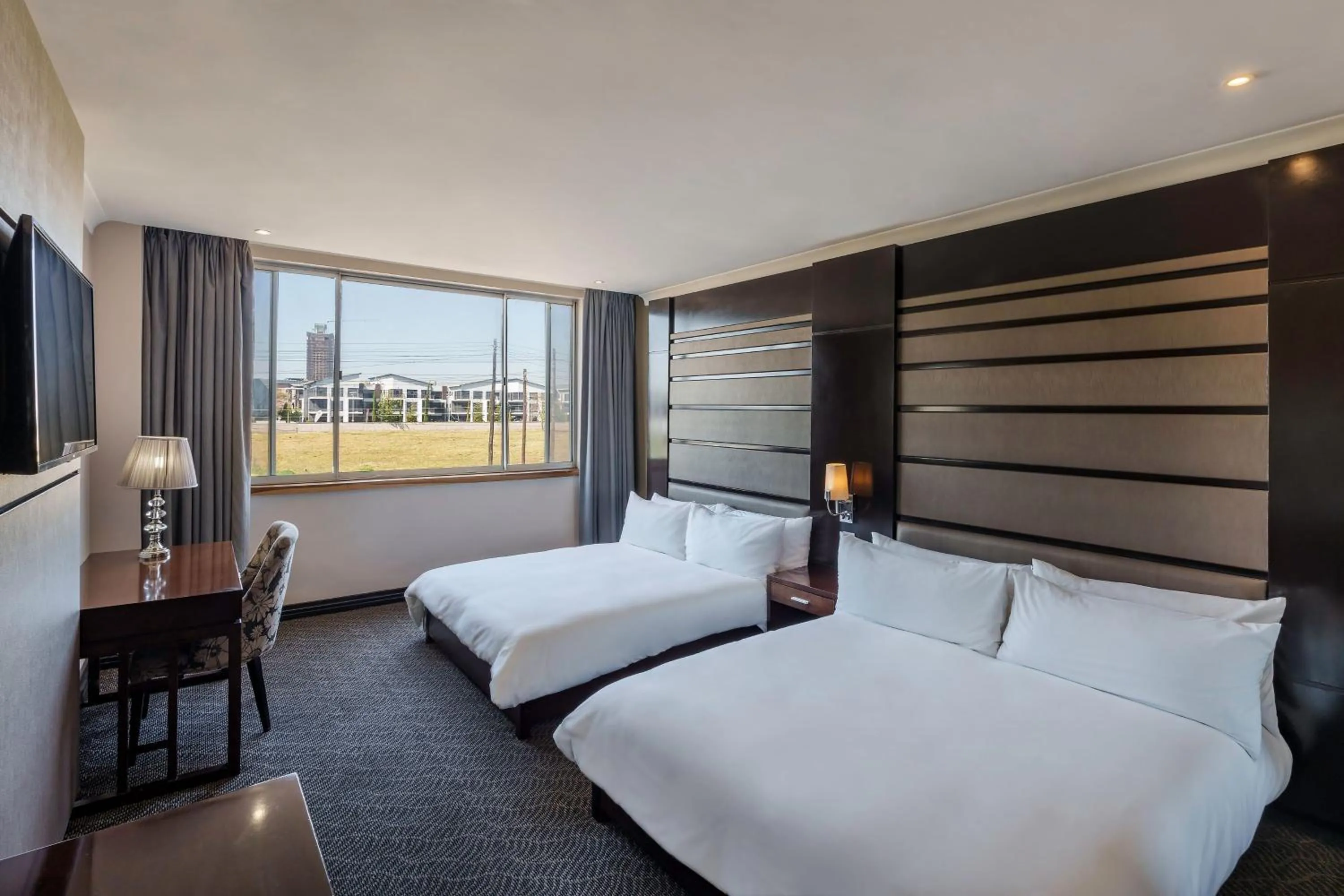 Photo of the whole room, Bed in Protea Hotel by Marriott Lusaka Tower