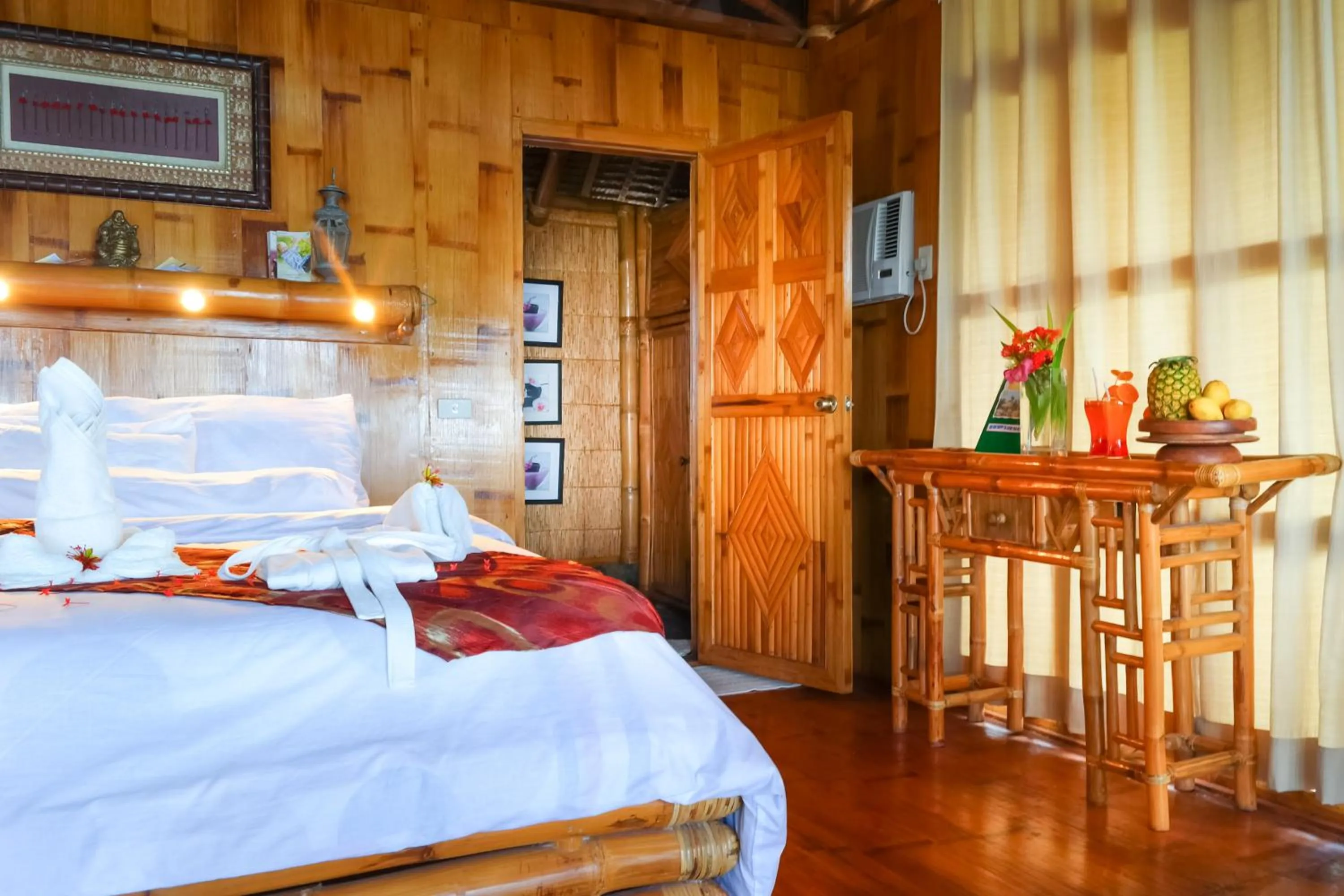 Photo of the whole room, Bed in The Coral Blue Oriental Beach Villas and Suites